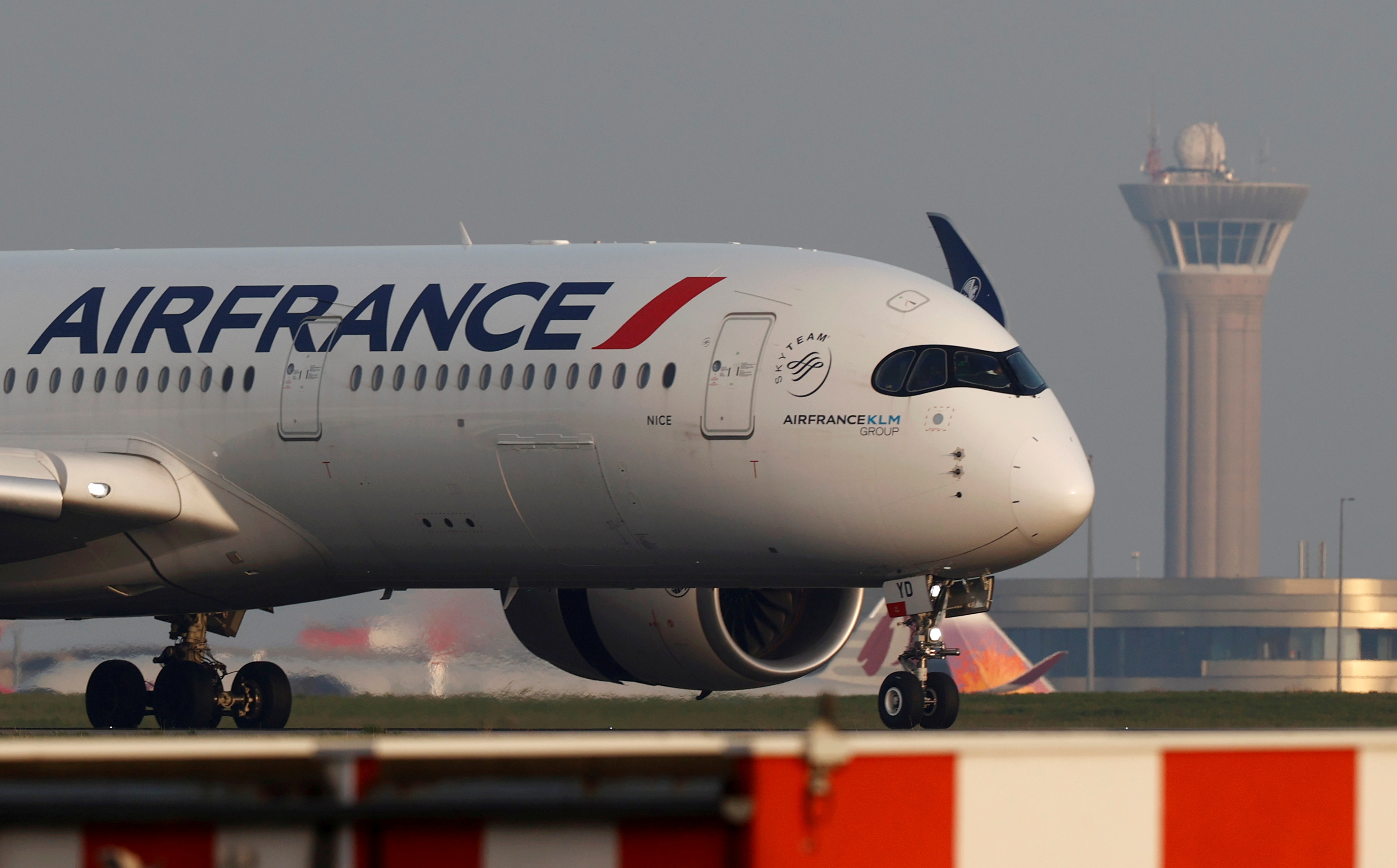 An Air France airplane lands at the Charles-de-Gaulle airport in Roissy
