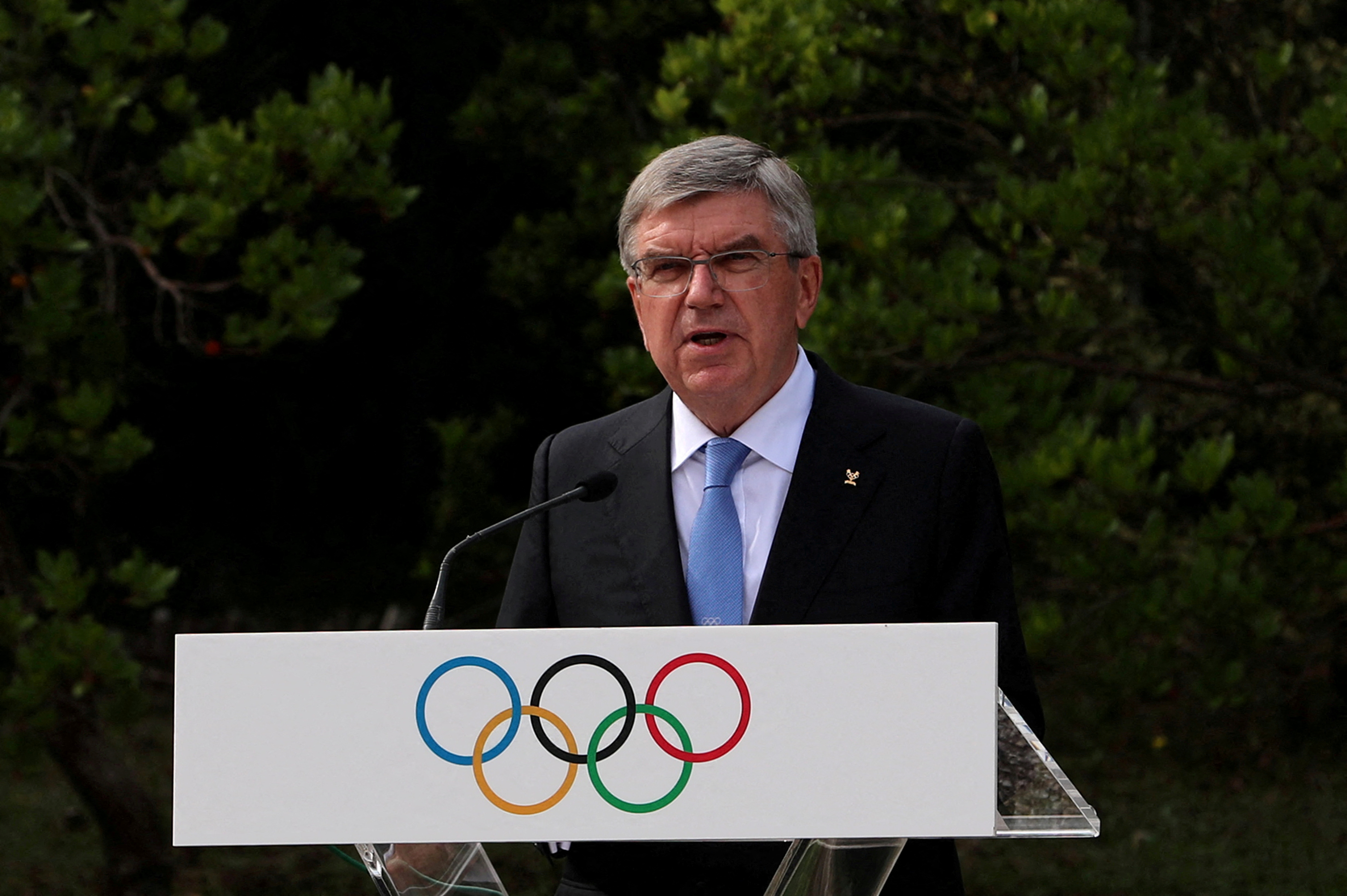 President of the International Olympic Committee (IOC) Thomas Bach delivers a speech at the Pierre de Coubertin monument, where the founder of the IOC's heart is buried, during a ceremony for the 100-year anniversary of the creation of the IOC