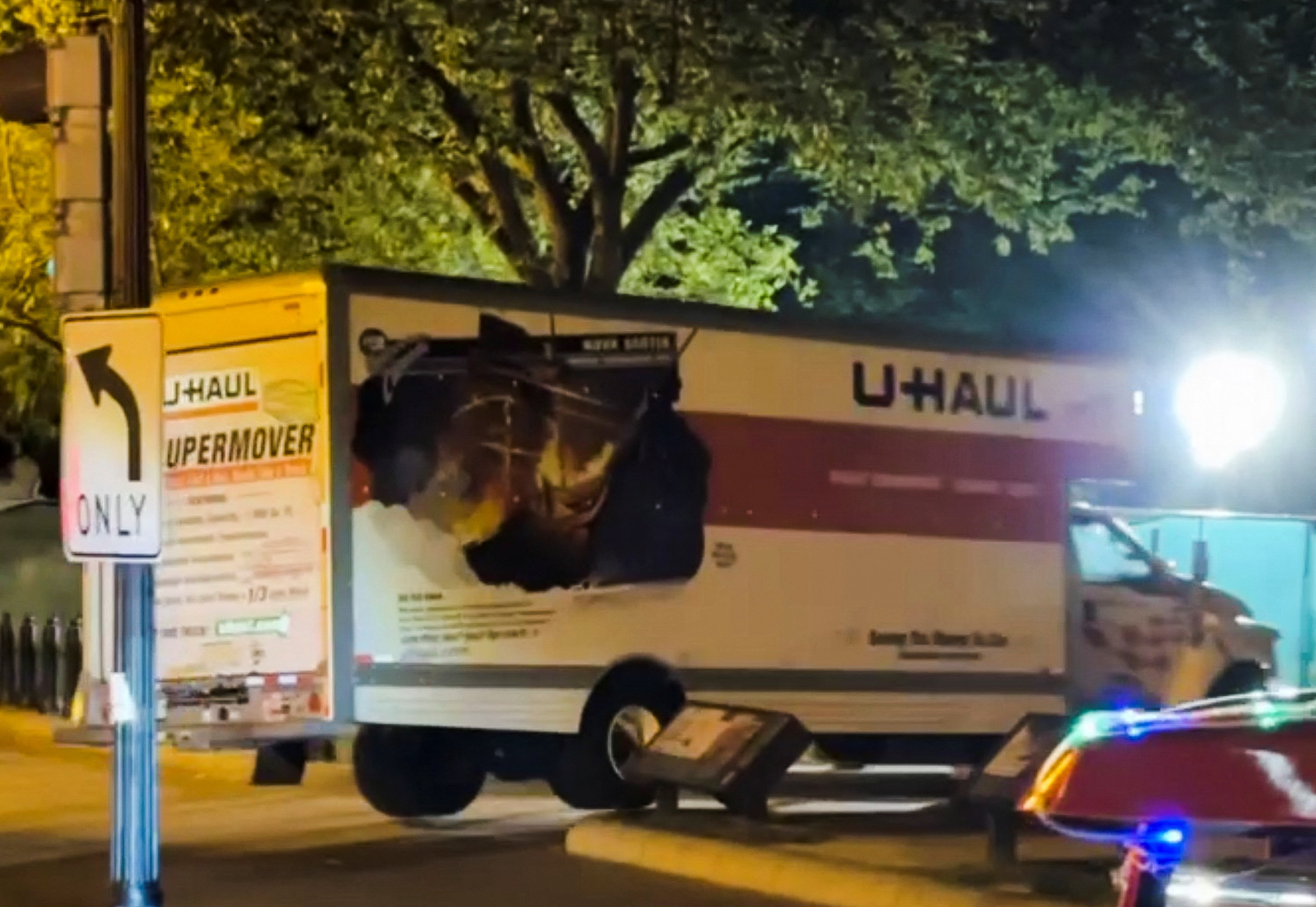 A box truck crashes into security barriers in Lafayette Square next to the White House grounds in Washington