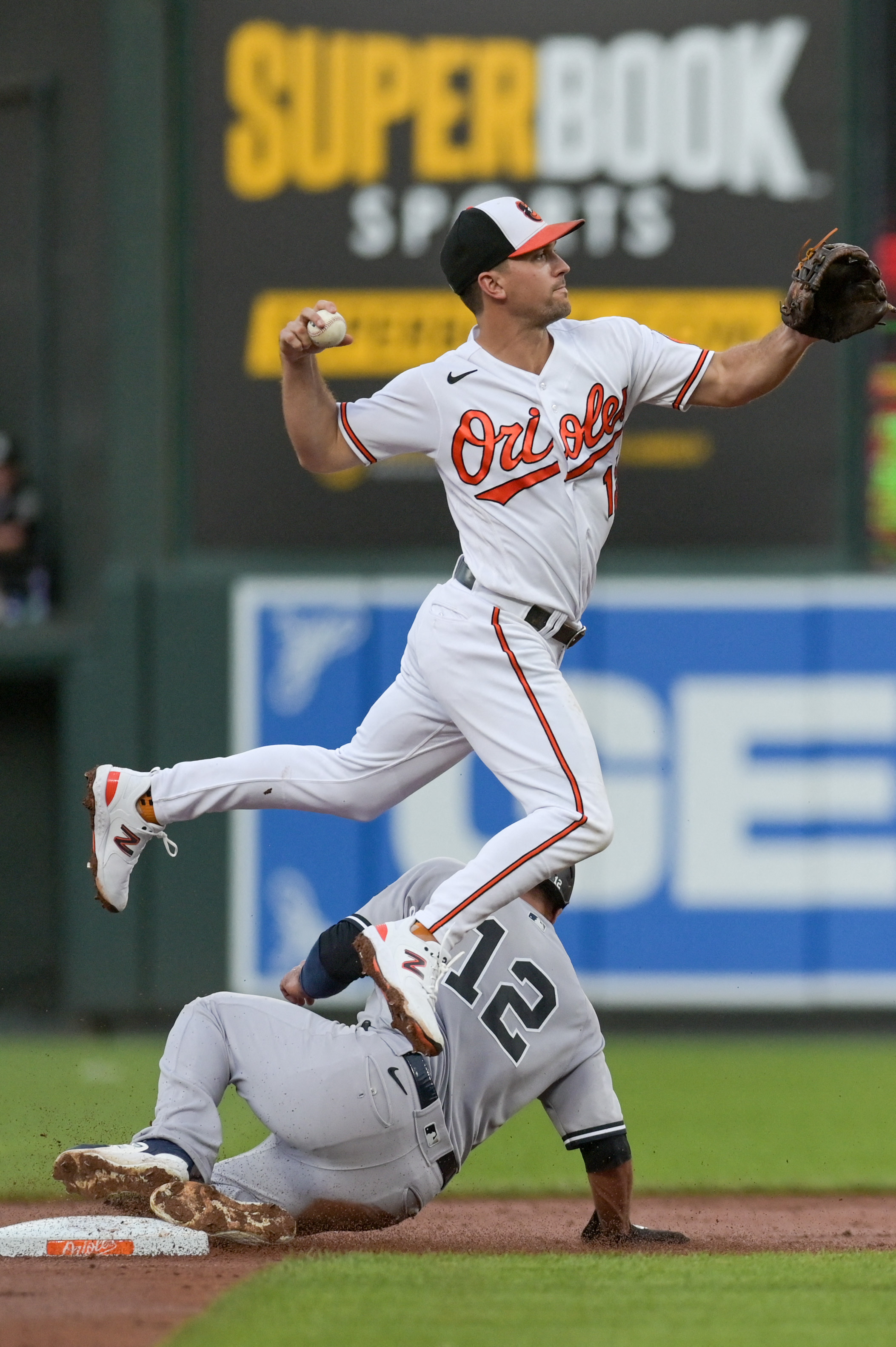 Baltimore, United States. 16th Apr, 2022. Baltimore Orioles shortstop Ramon  Urias (R) is called out on a strike as New York Yankees catcher Kyle  Higashioka (L) gestures during the seventh inning of