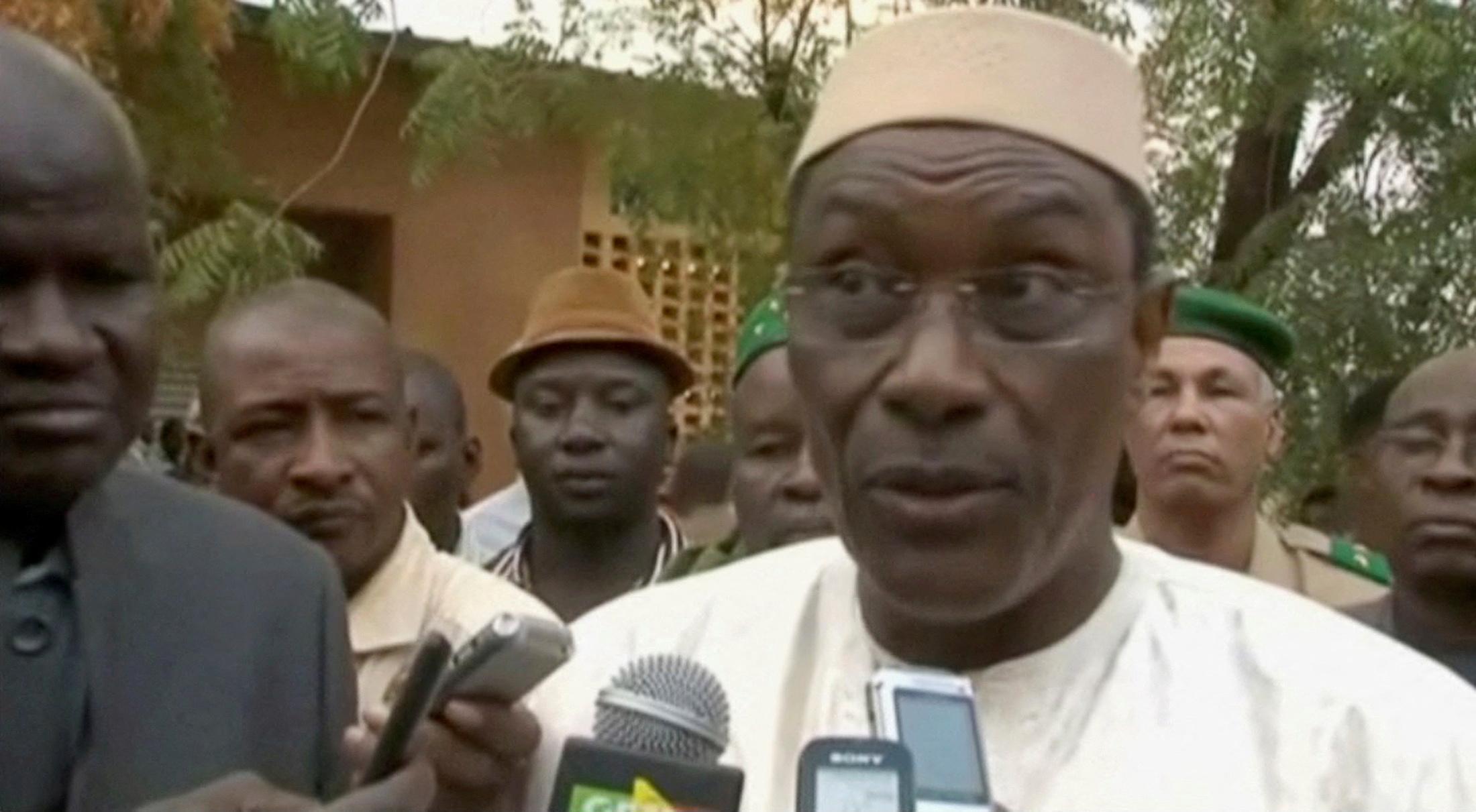 A still image taken from video shows Mali's then Defence Minister Abdoulaye Idrissa Maiga speaking to the media at Gao hospital, in Mali