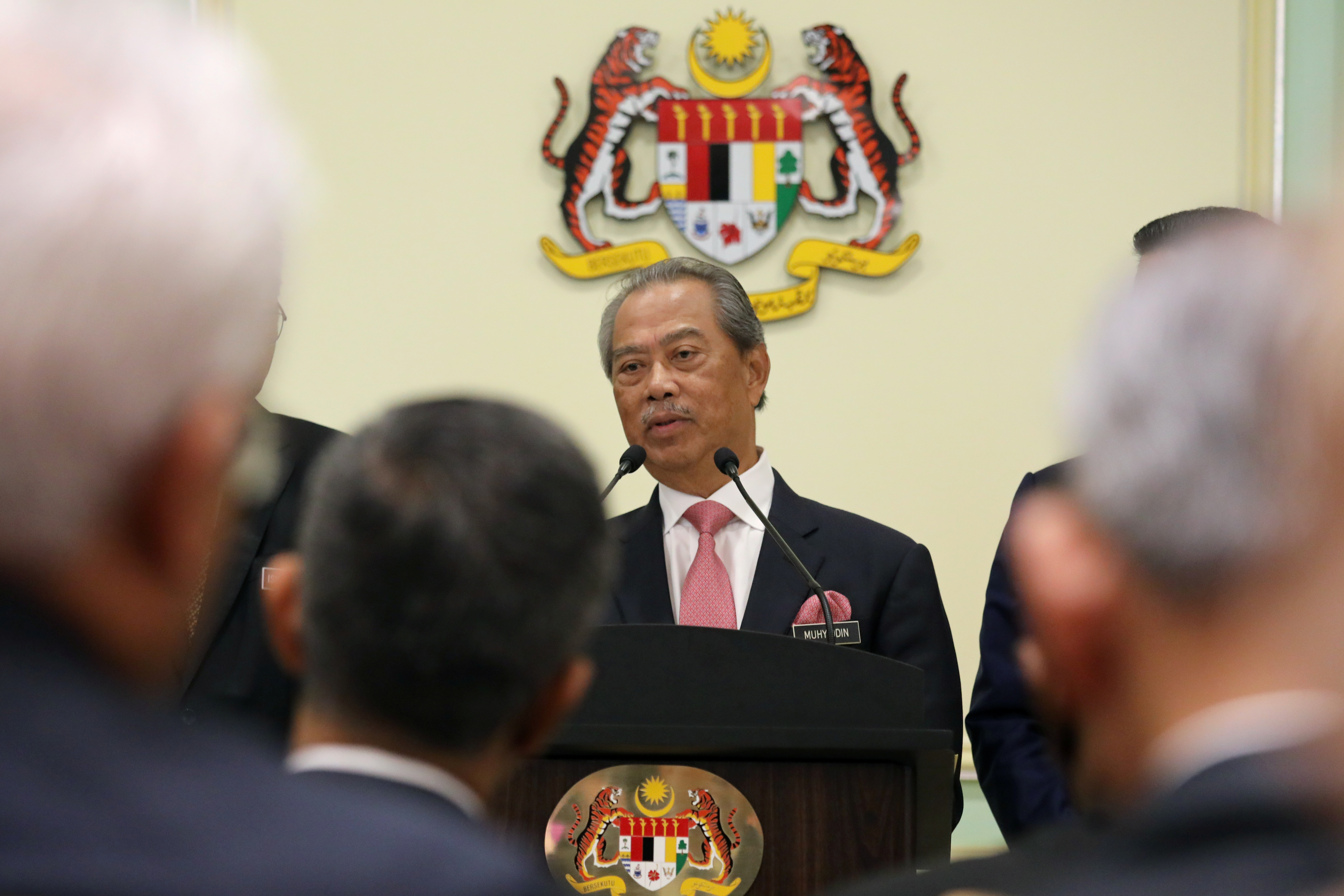 Malaysia's Prime Minister Muhyiddin Yassin speaks during a news conference in Putrajaya
