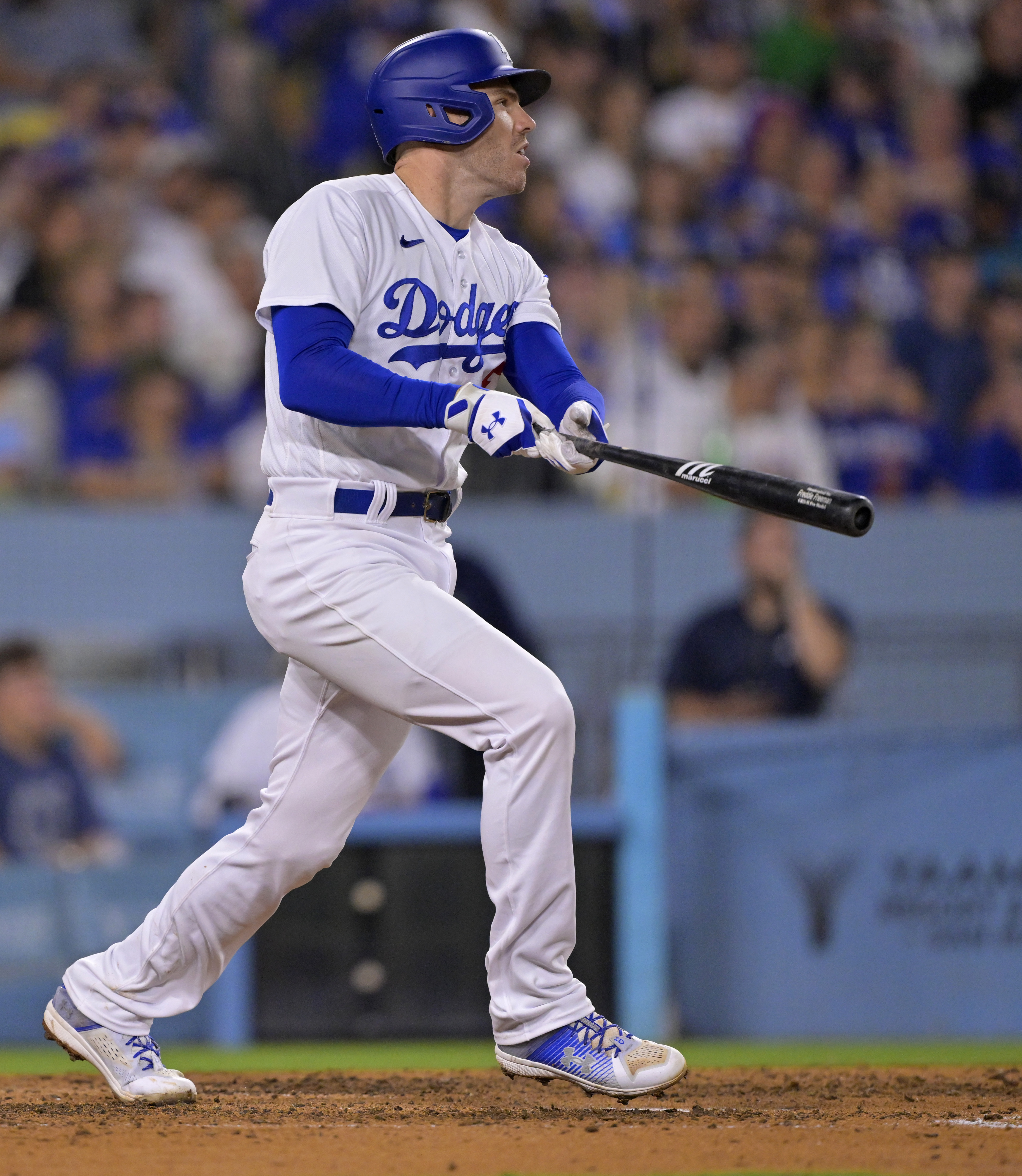 Dodgers use four-run sixth to tame Rockies, 6-1