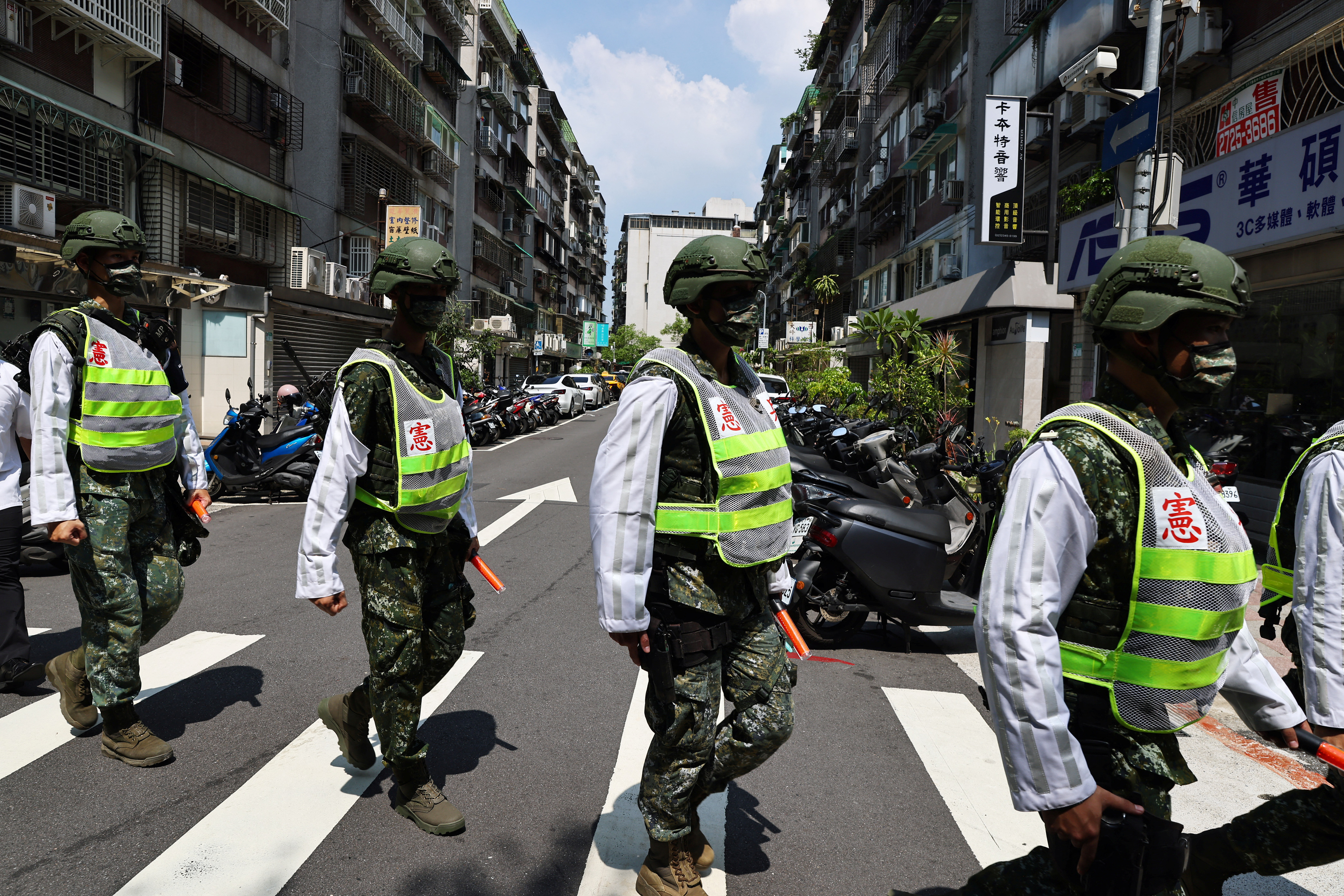 Military police officers get into position for a drill in Taipei