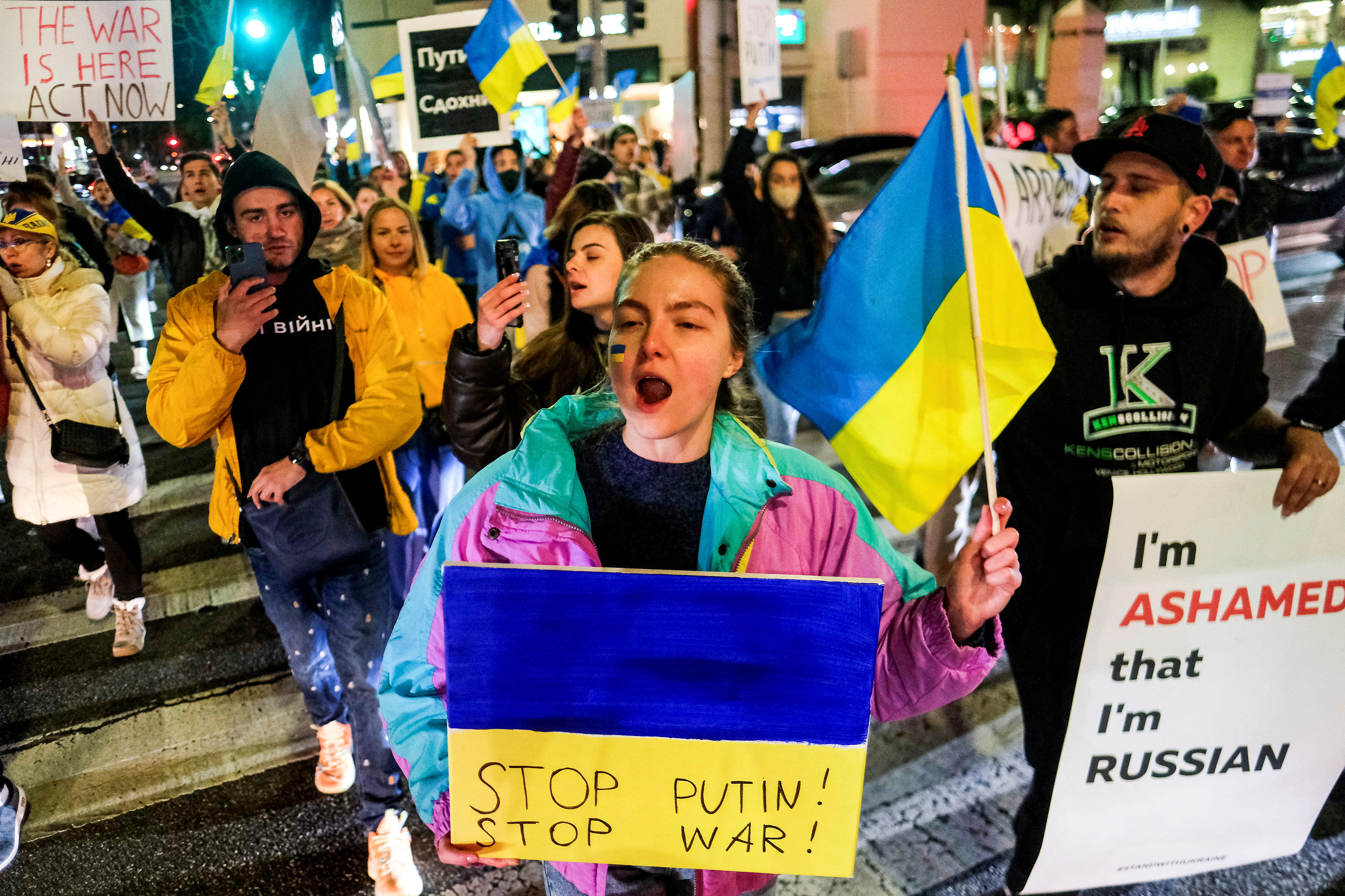 Members of the Russian community demonstrate against the Russian invasion of Ukraine in Los Angeles