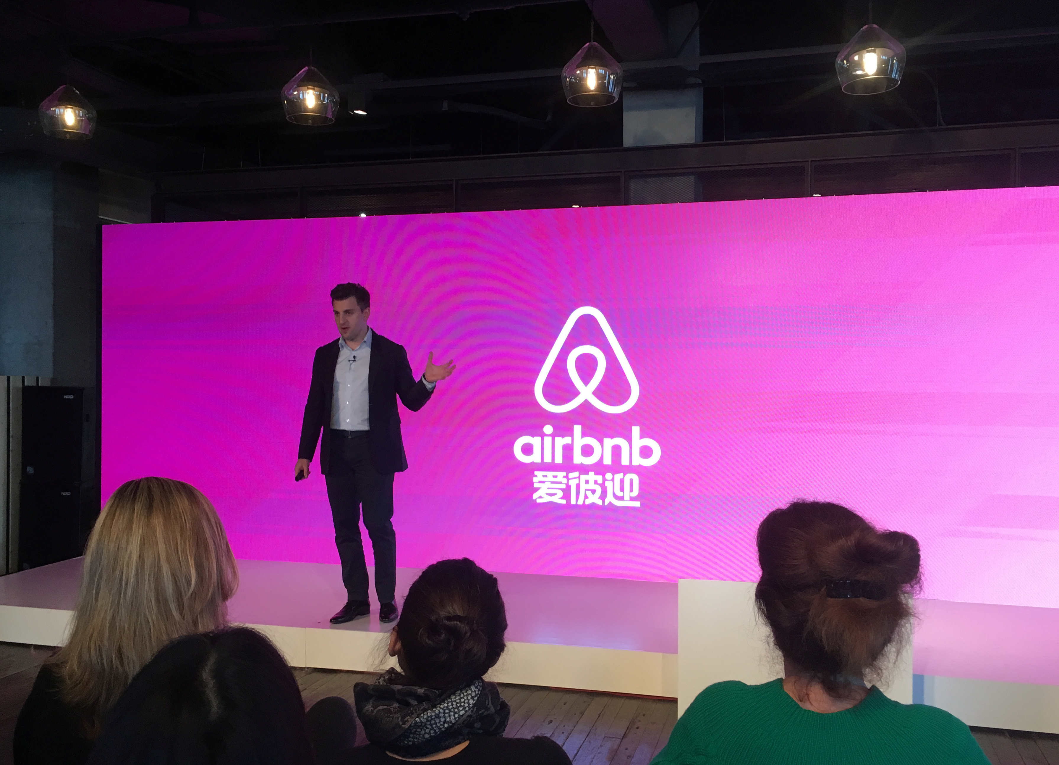 Airbnb Co-Founder and CEO Brian Chesky speaks at an event to launch the brand's Chinese name, in Shanghai