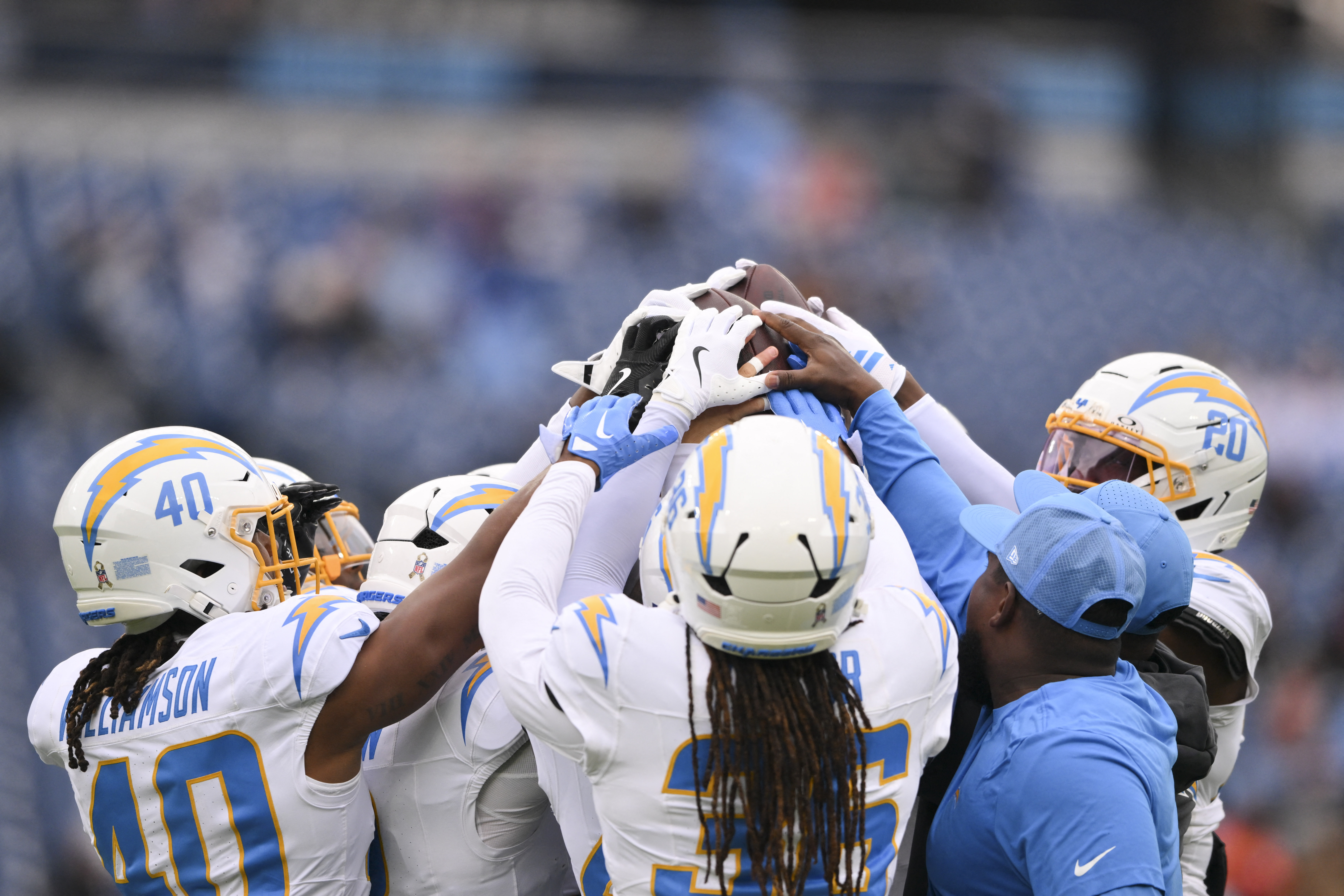 Justin Herbert's 3-TD day pushes Chargers past Titans | Reuters