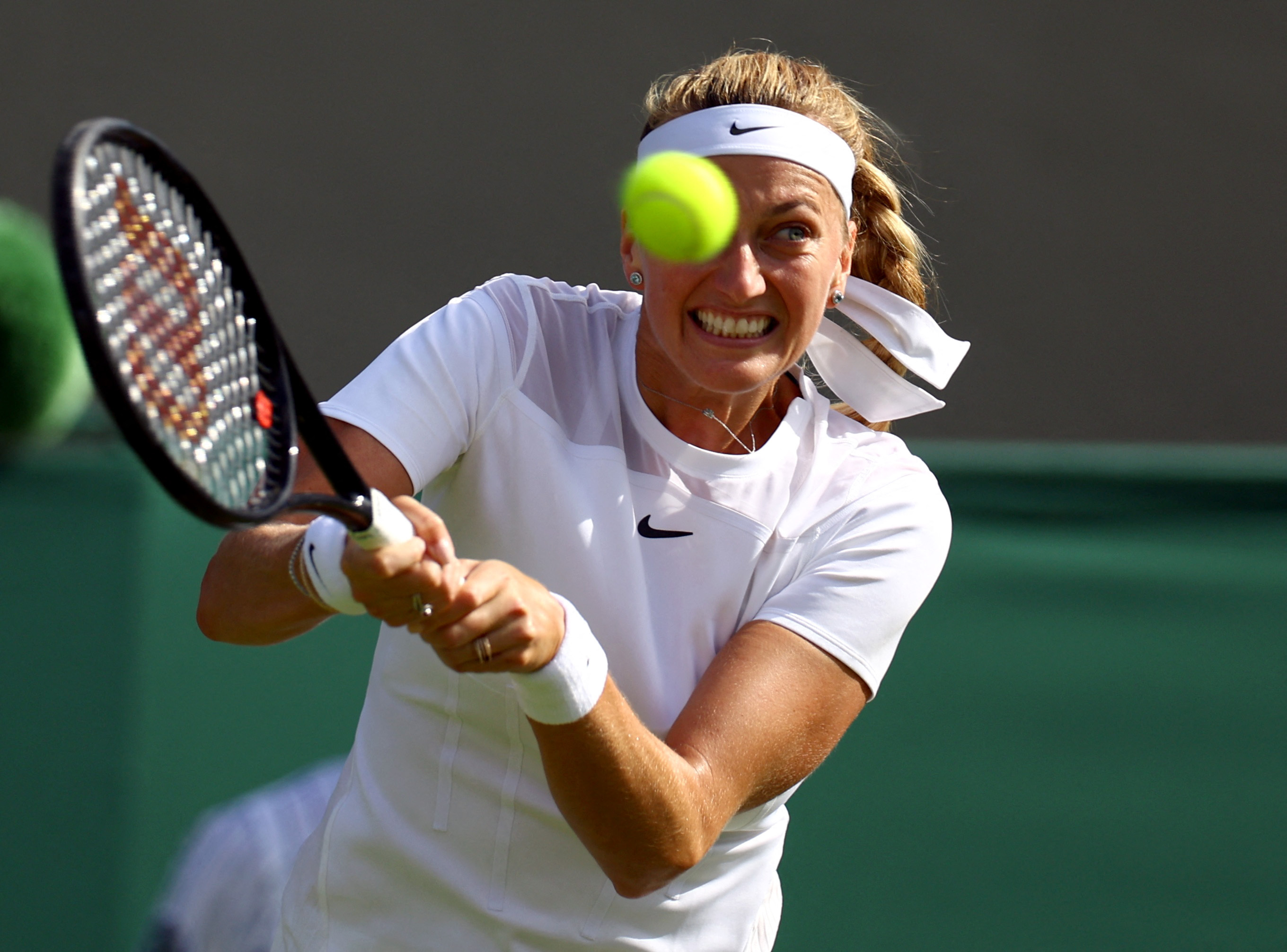 Twice champion Kvitova rallies against Paolini to reach second round ...