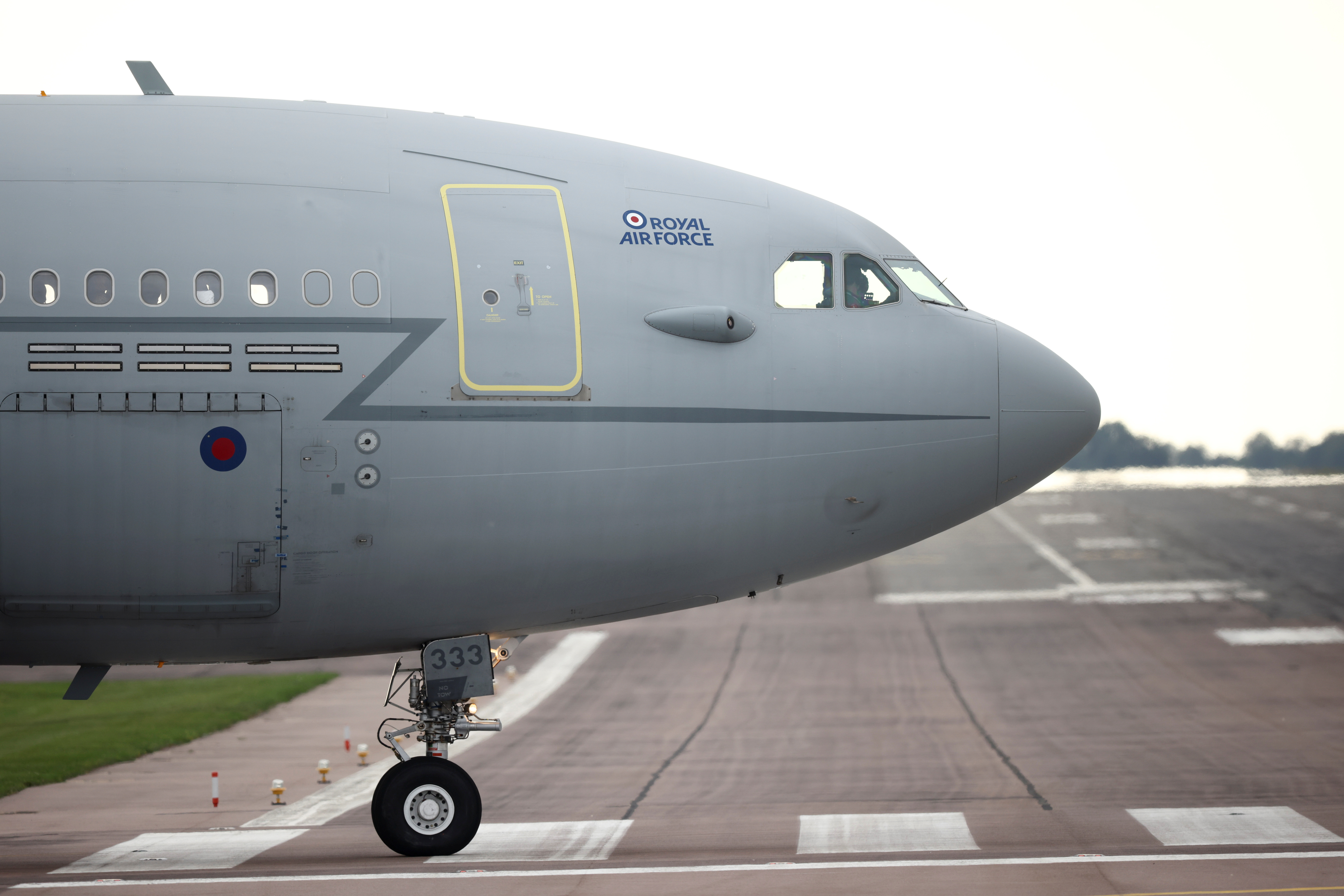 A RAF Voyager plane carrying military personnel prepares to take off at the RAF Brize Norton in Oxfordshire