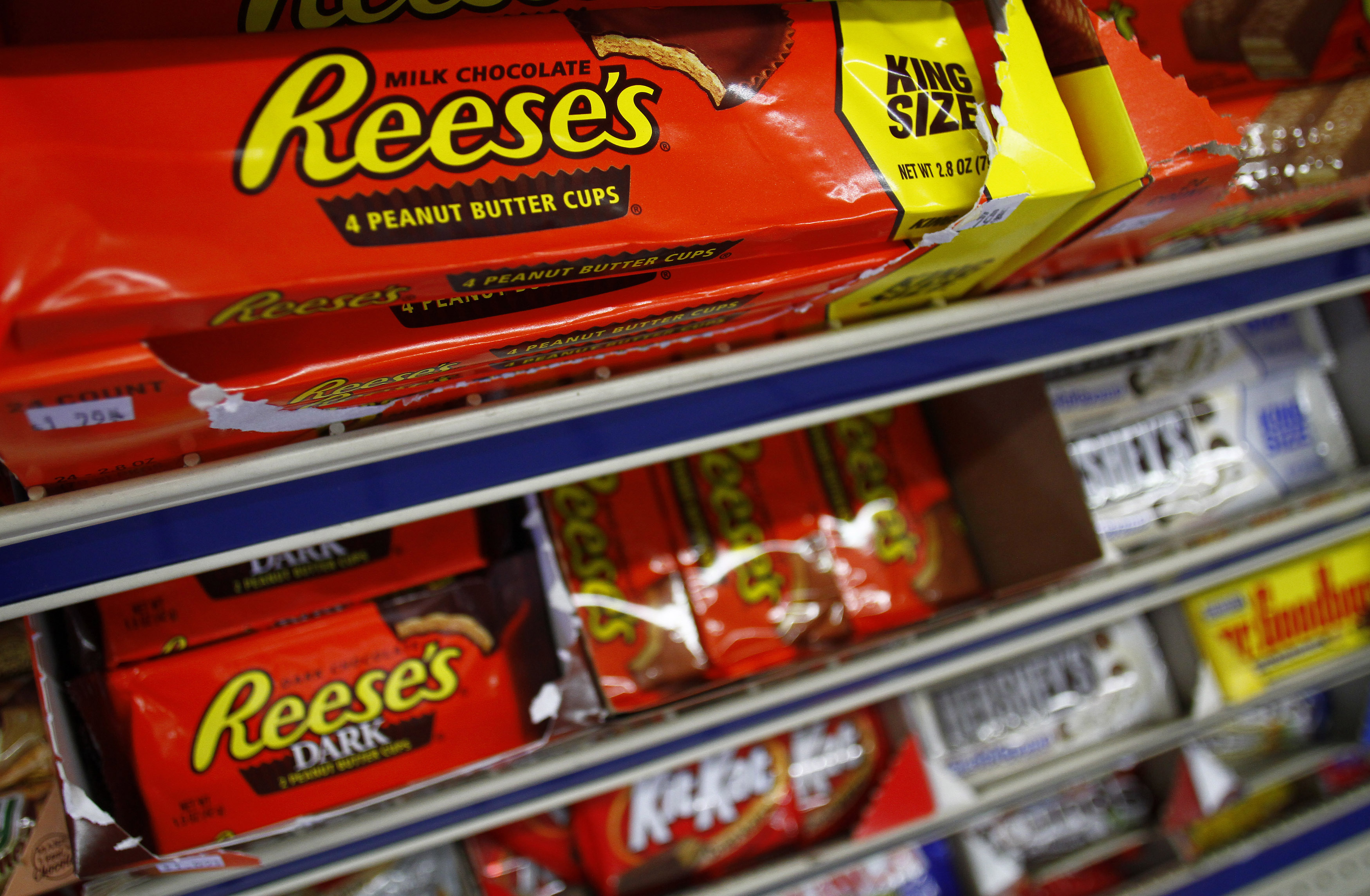 Packets of Reese's peanut butter cups, a Hershey product, are displayed at a gas station in Phoenix