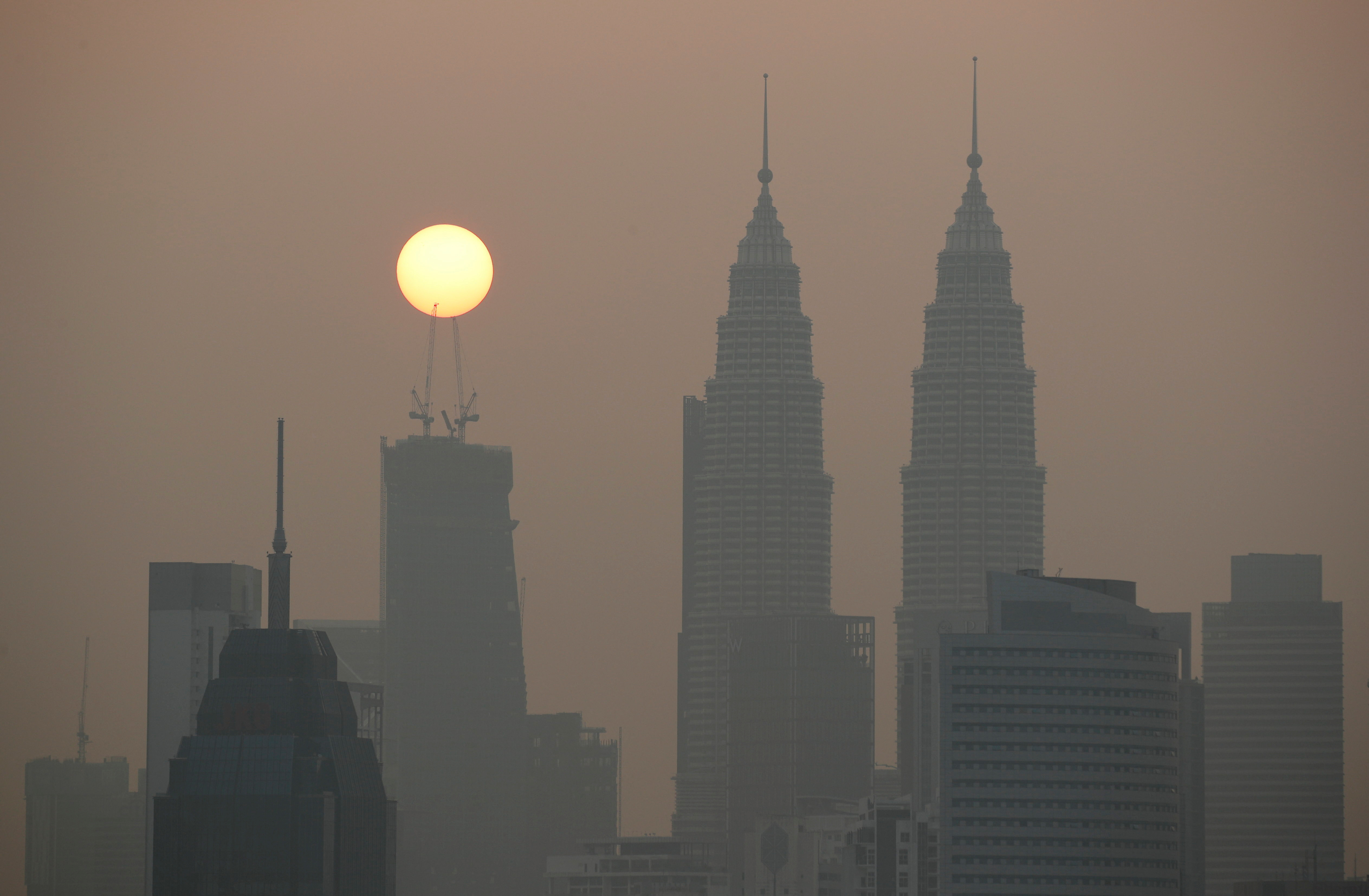 malaysia-says-cross-border-air-pollution-law-still-possible-reuters