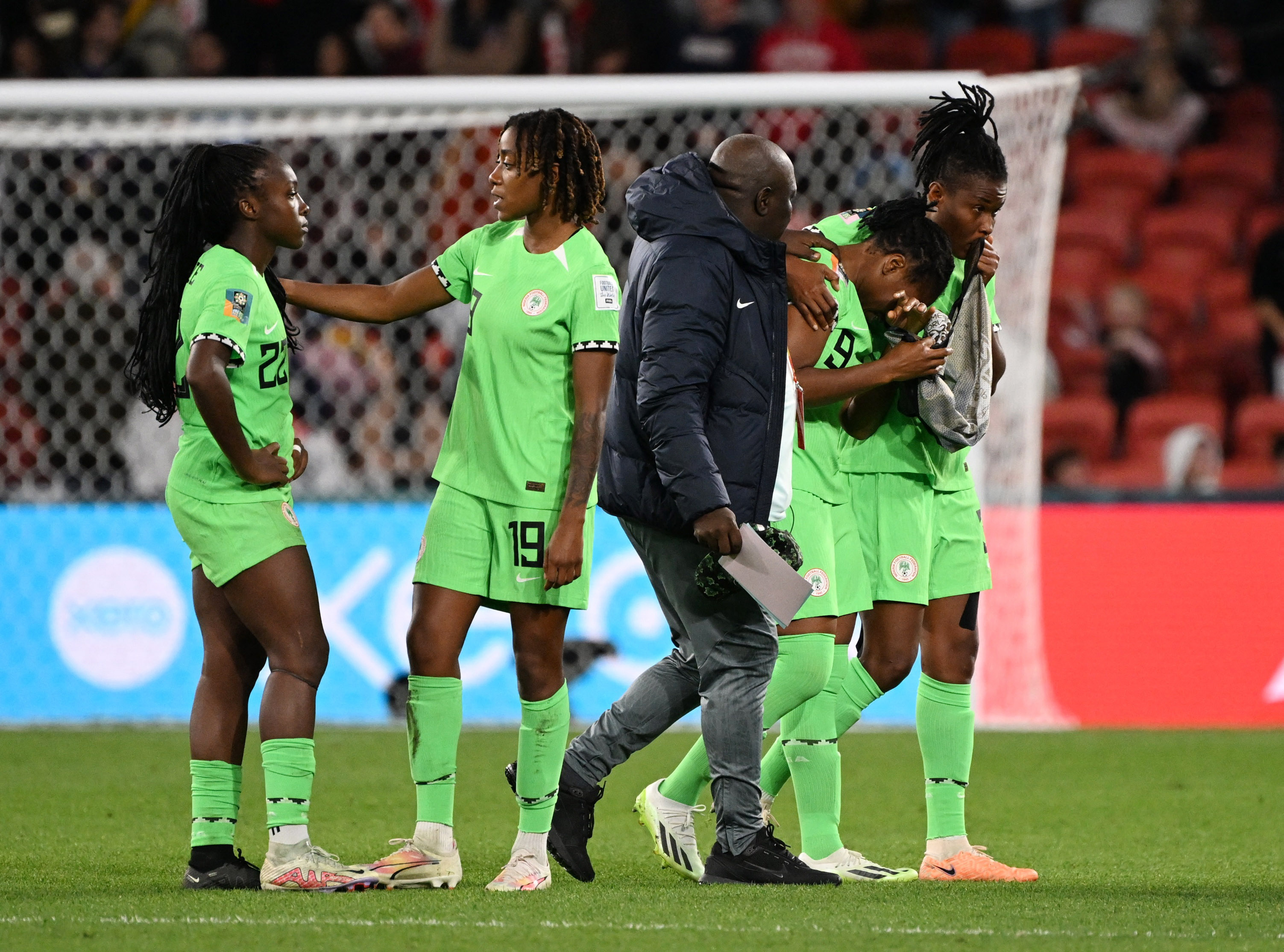 Soccer-Nigeria go home with heads held high after agonising exit