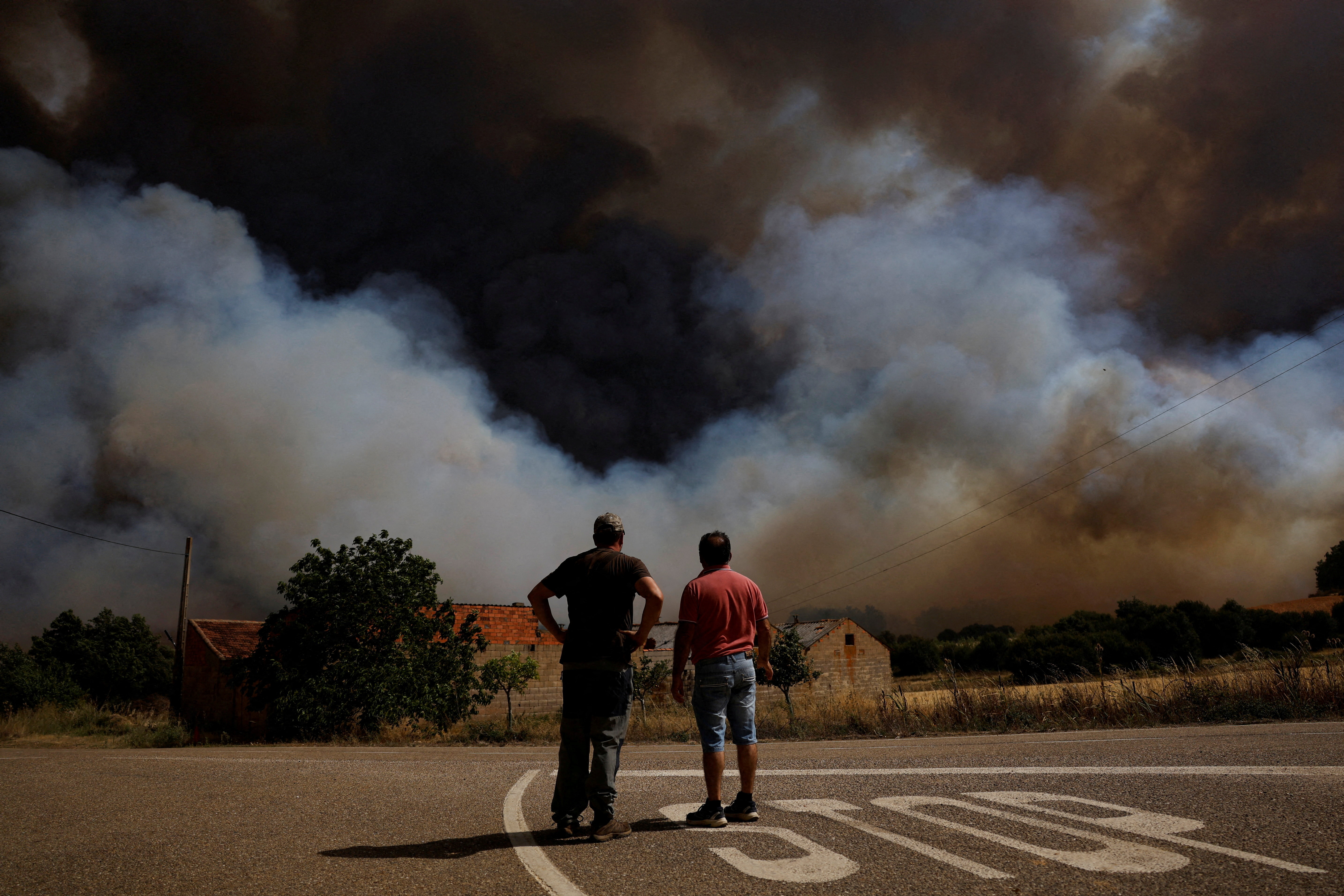In pictures: Firefighters battle 'fire whirls' in northern Spain