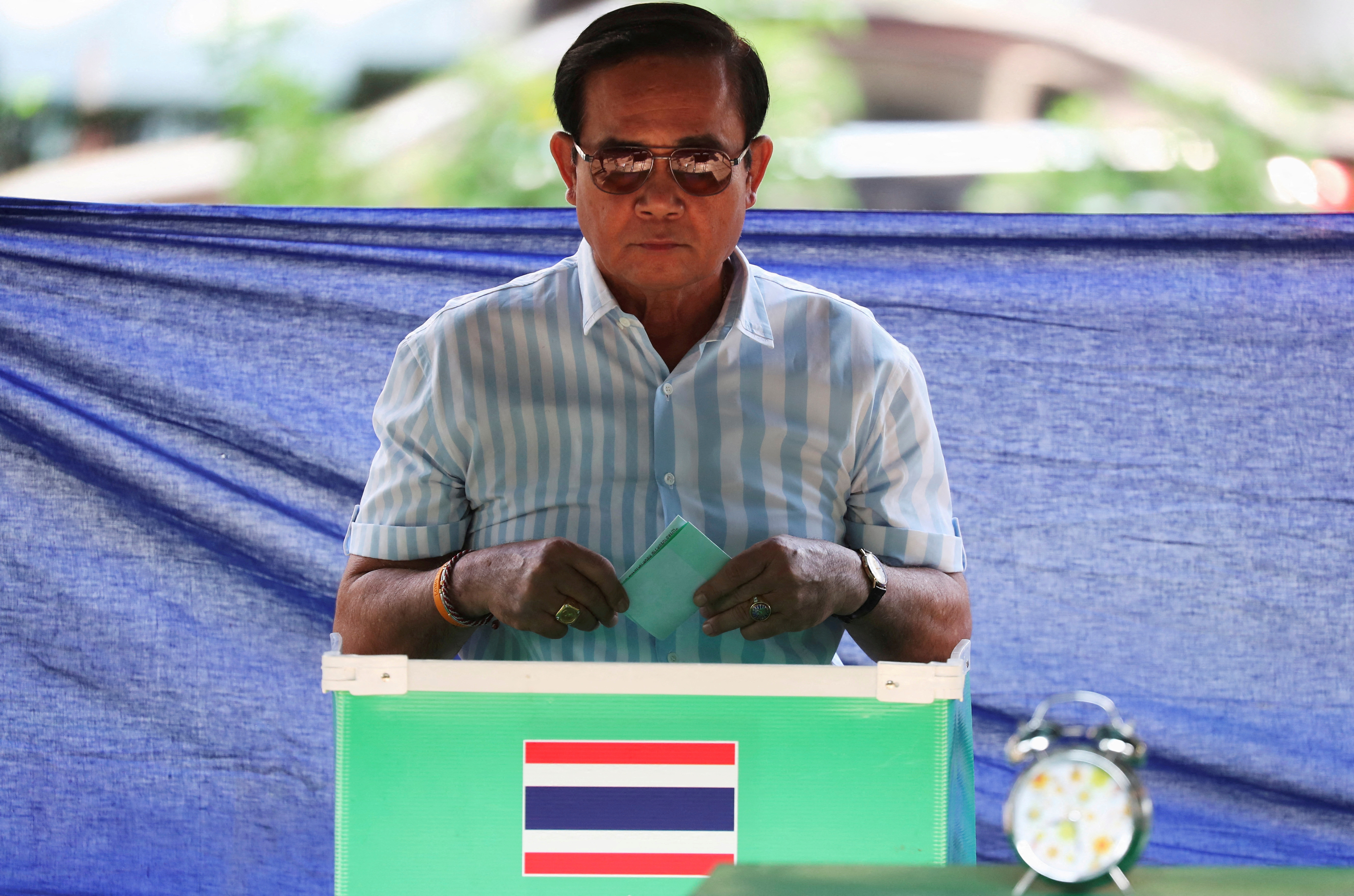 Thailand's Prime Minister Prayuth Chan-ocha casts his ballot to vote in the general election at a polling station in Bangkok