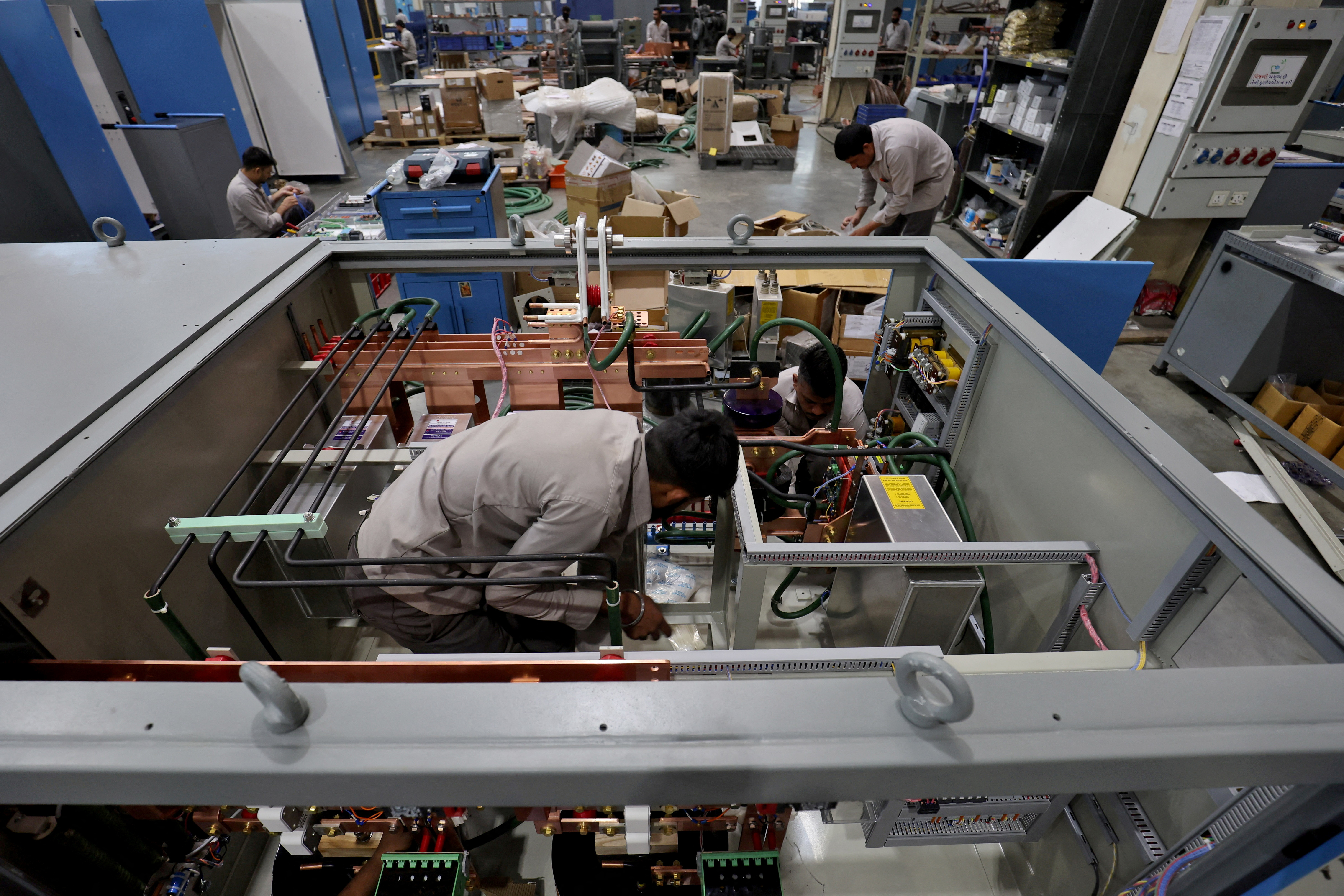 Employees assemble an electric transformer inside a manufacturing unit of Electrotherm (India)  Private Limited at Sanand GIDC (Gujarat Industrial Development Corporation), on the outskirts of Ahmedabad