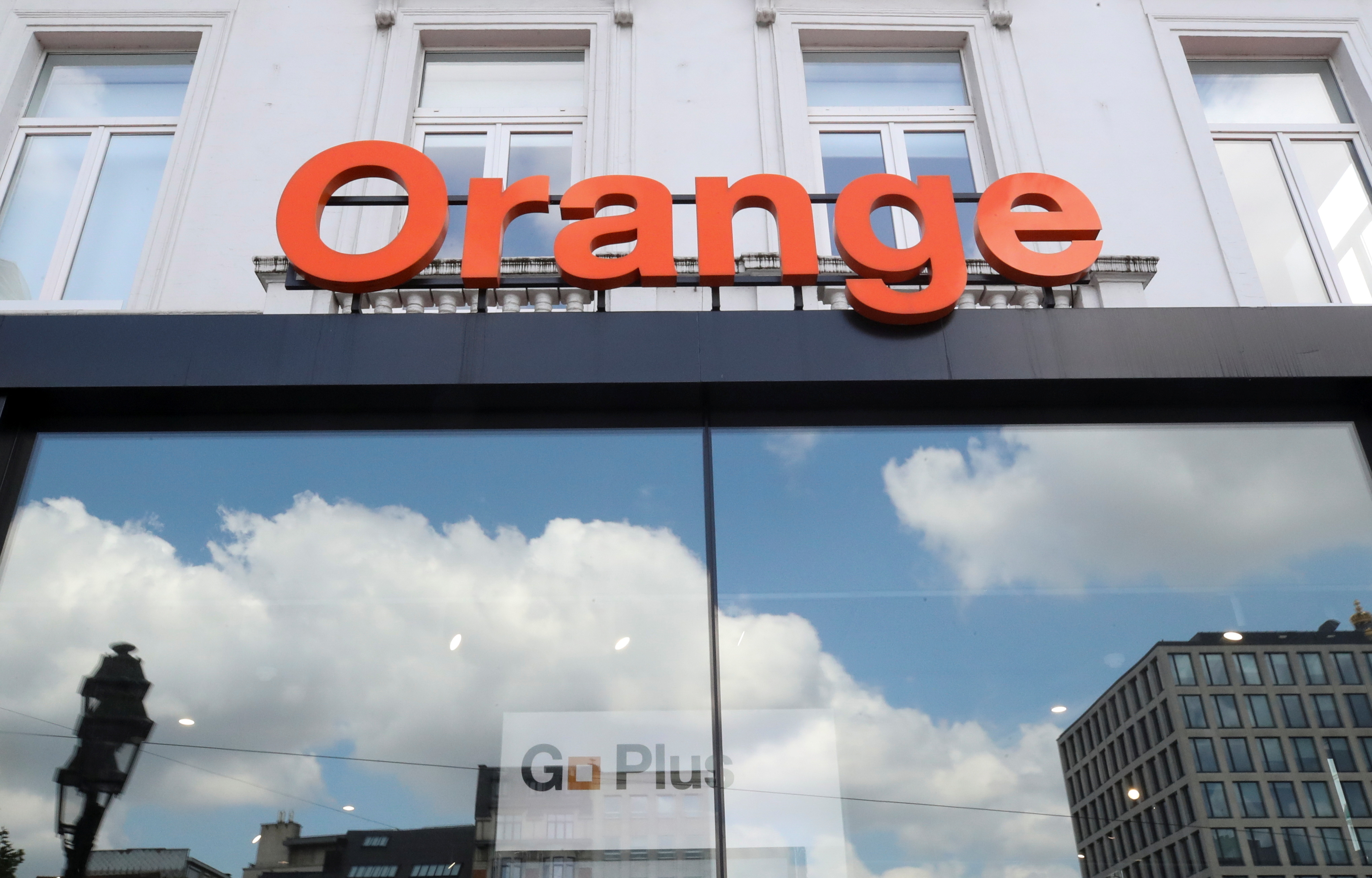 A logo of telecommunication company Orange is seen at the entrance of a shop in Brussels