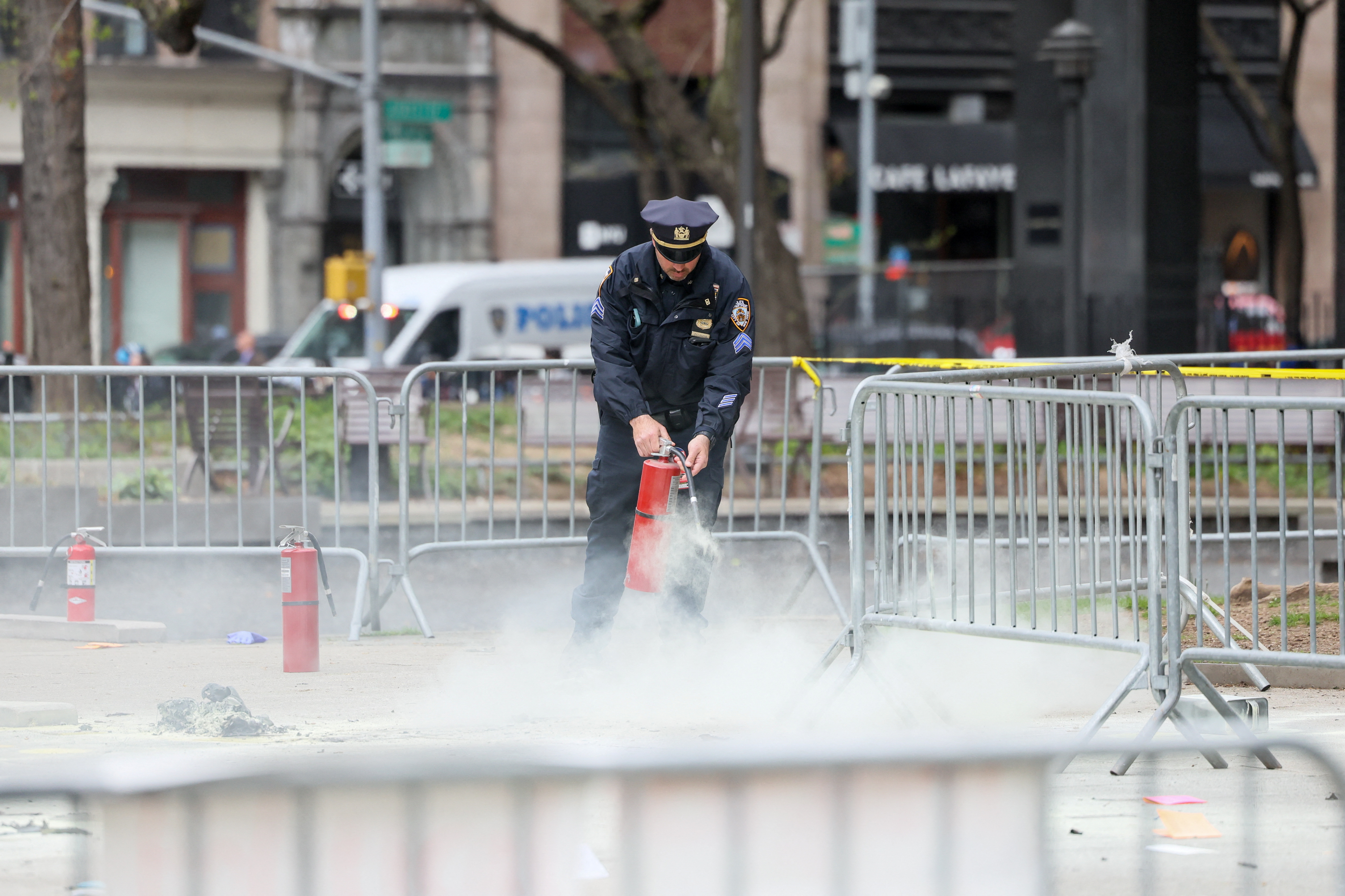Aftermath of a person covered in flames outside NY courthouse of former U.S. President Trump's criminal hush money trial