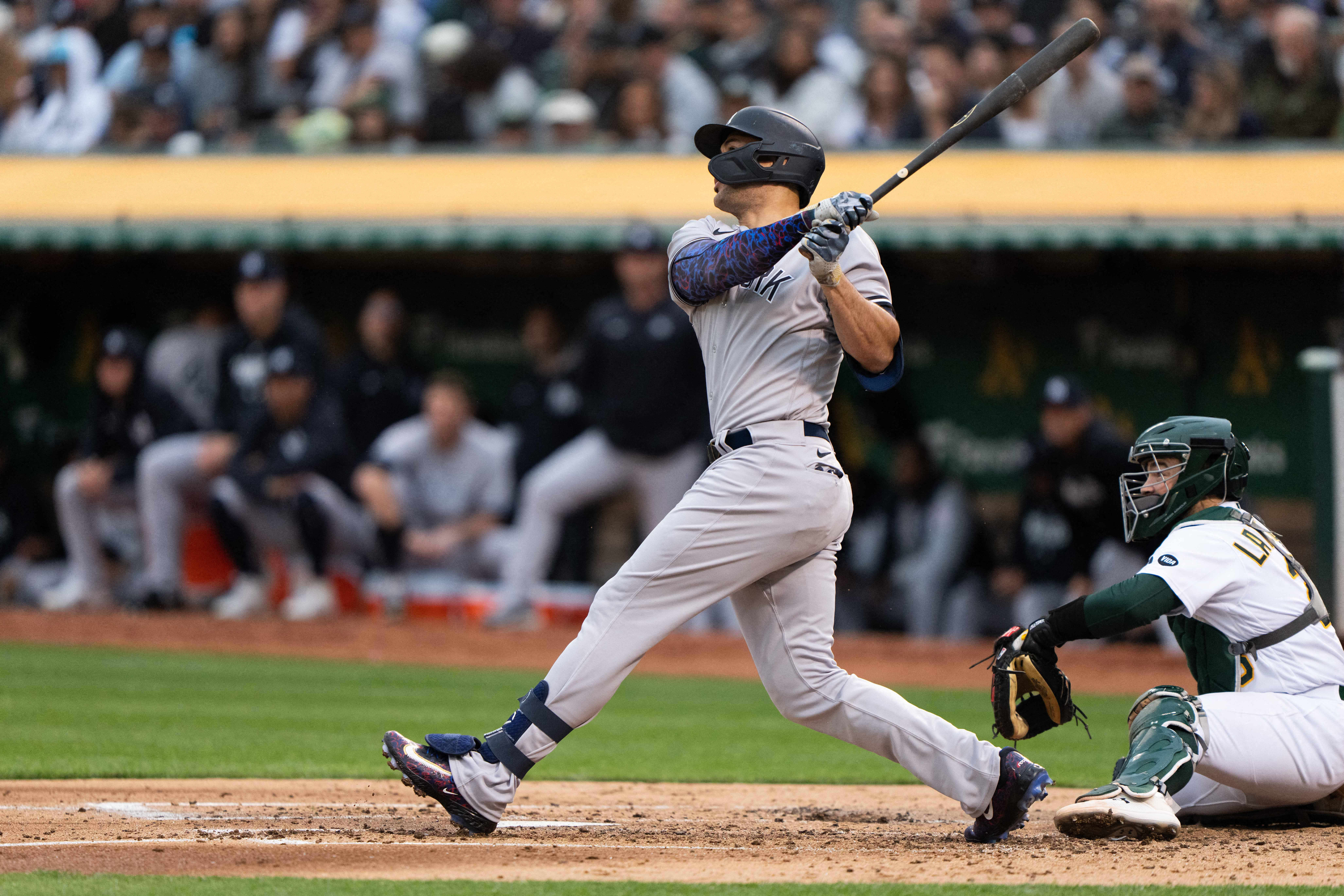 Tampa Bay Rays' Randy Arozarena, left, is tagged out by San Francisco  Giants first baseman LaMonte Wade Jr. during the first inning of a baseball  game in San Francisco, Monday, Aug. 14