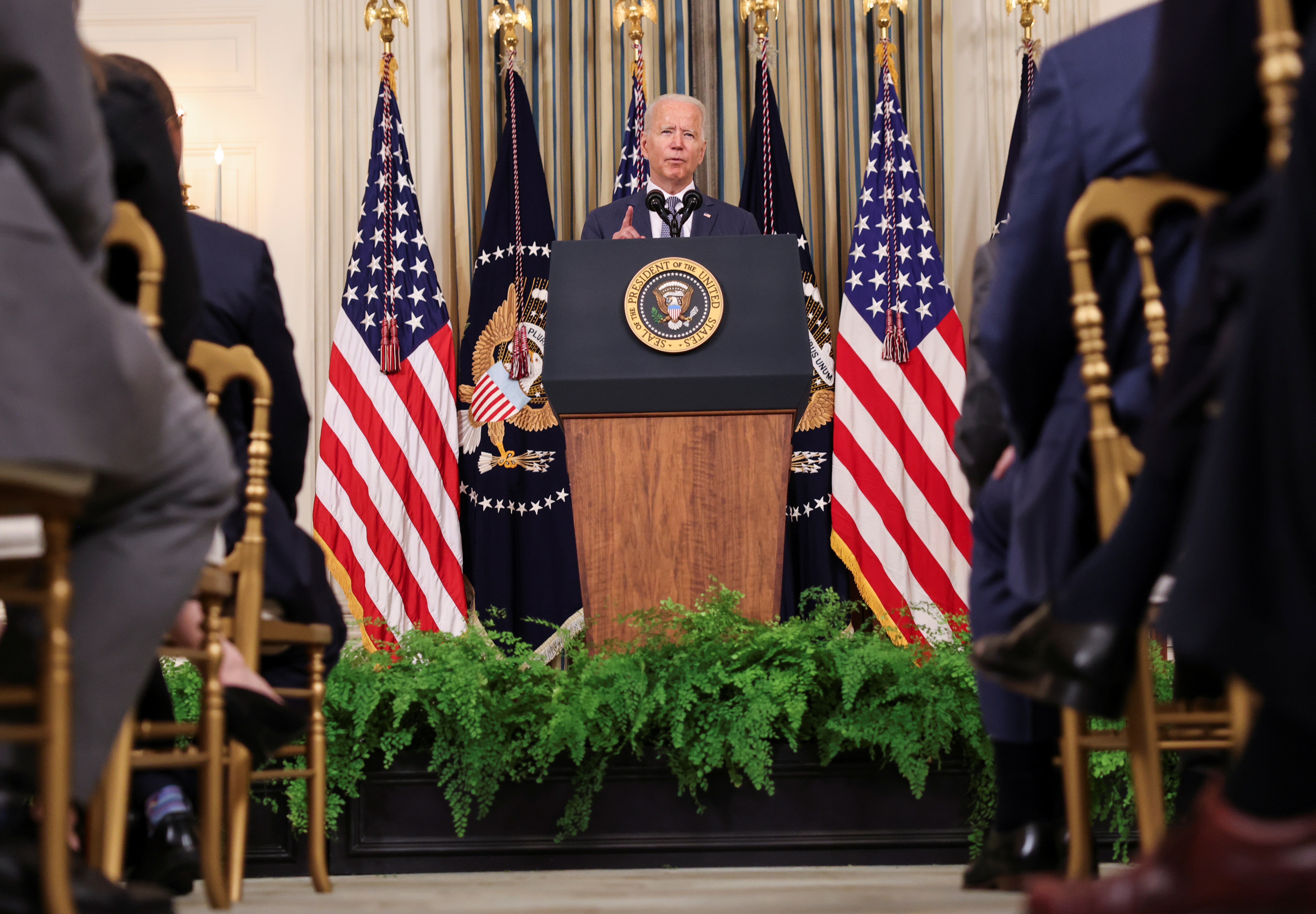 U.S. President Biden signs executive order on U.S. economy at the White House in Washington