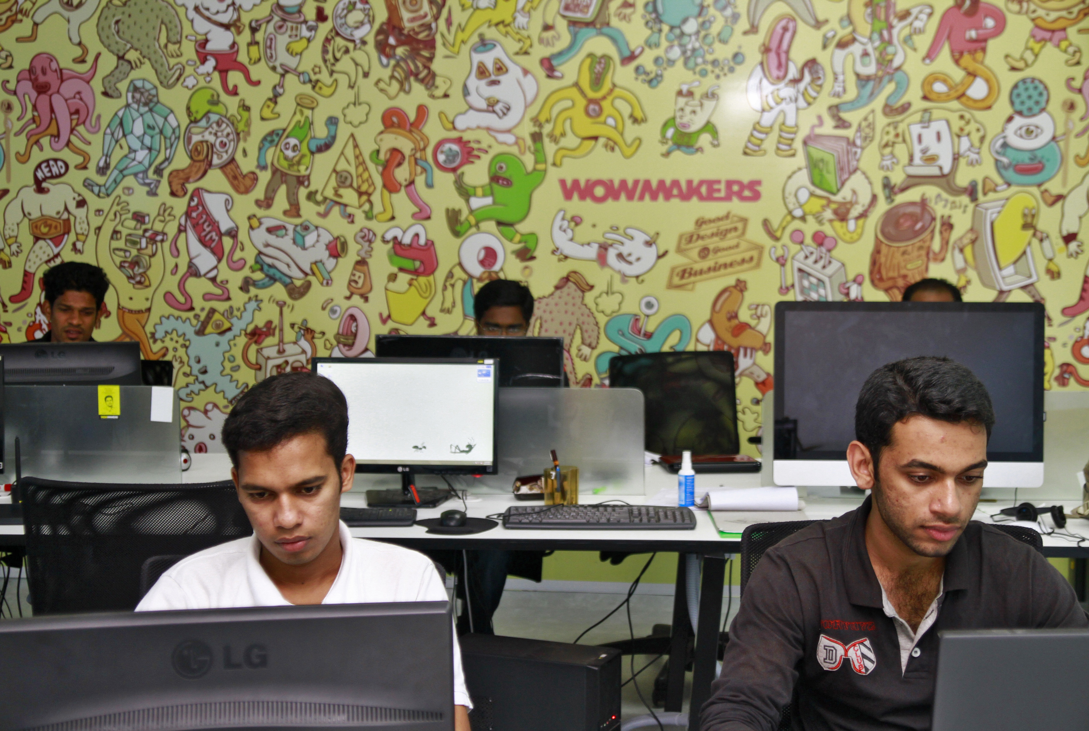 Design artists work on their computer terminals at the Start-up Village in Kinfra High Tech Park in Kochi
