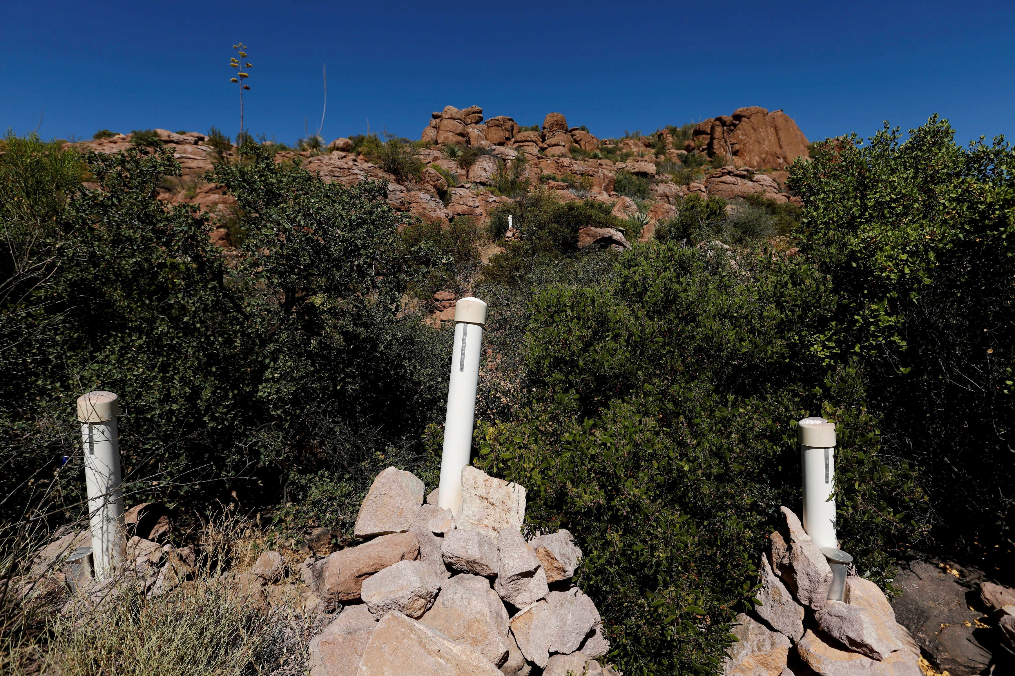 FILE PHOTO: Stakes mark a mining claim in the Oak Flats area near Superior, Arizona