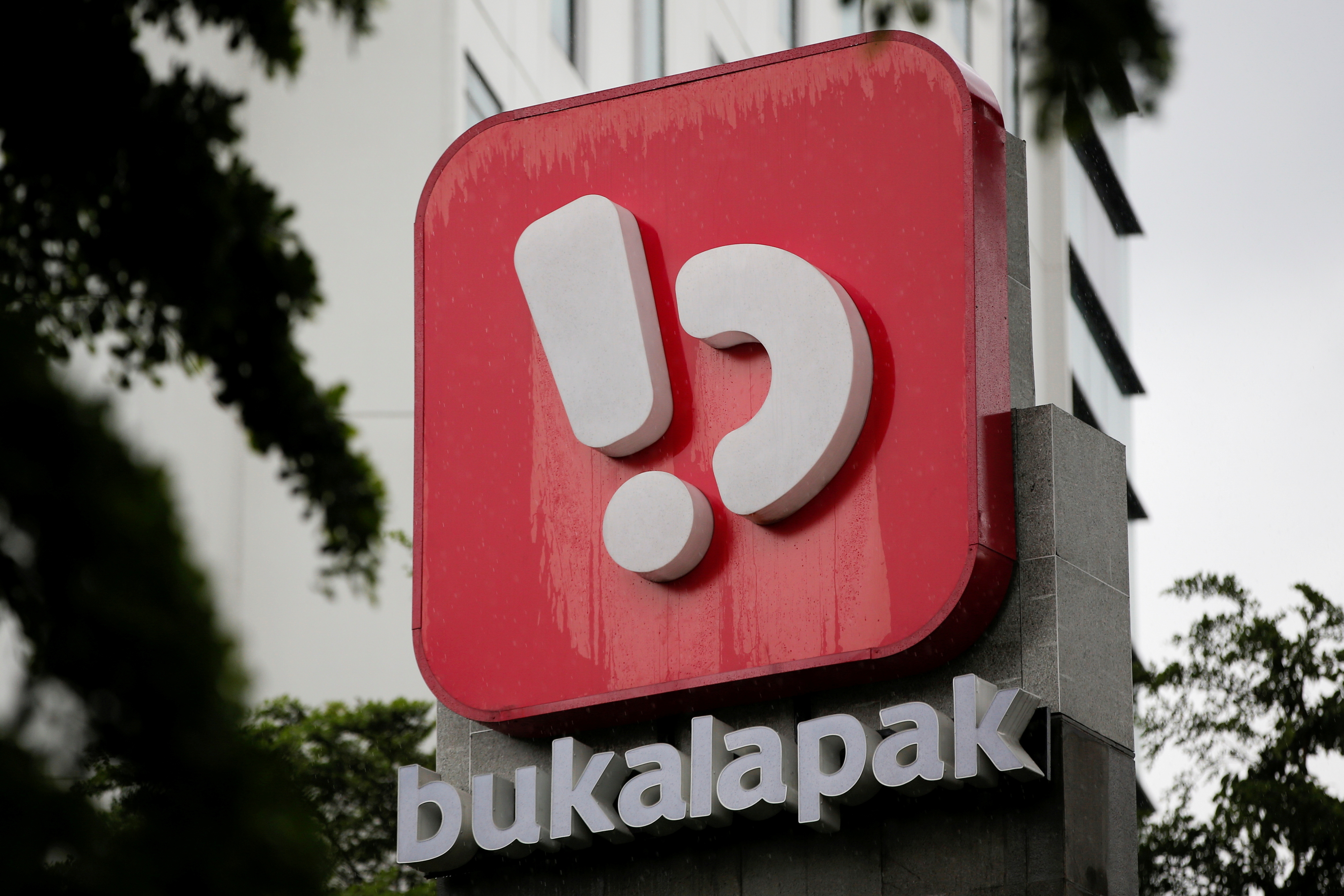 Logo of Bukalapak, an Indonesian e-commerce firm, is seen outside its headquarters in Jakarta