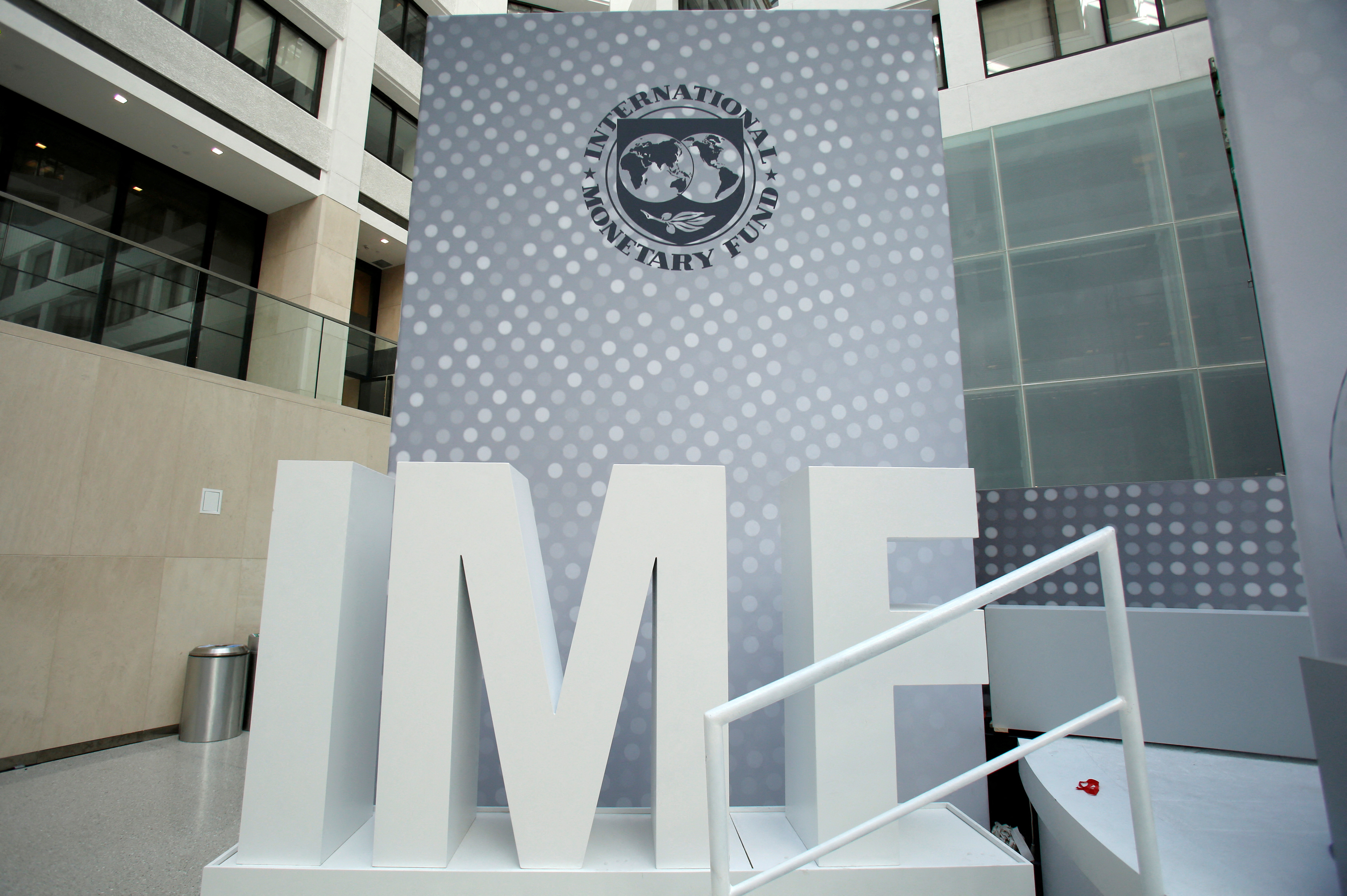 The International Monetary Fund logo is seen inside the headquarters at the end of the IMF/World Bank annual meetings