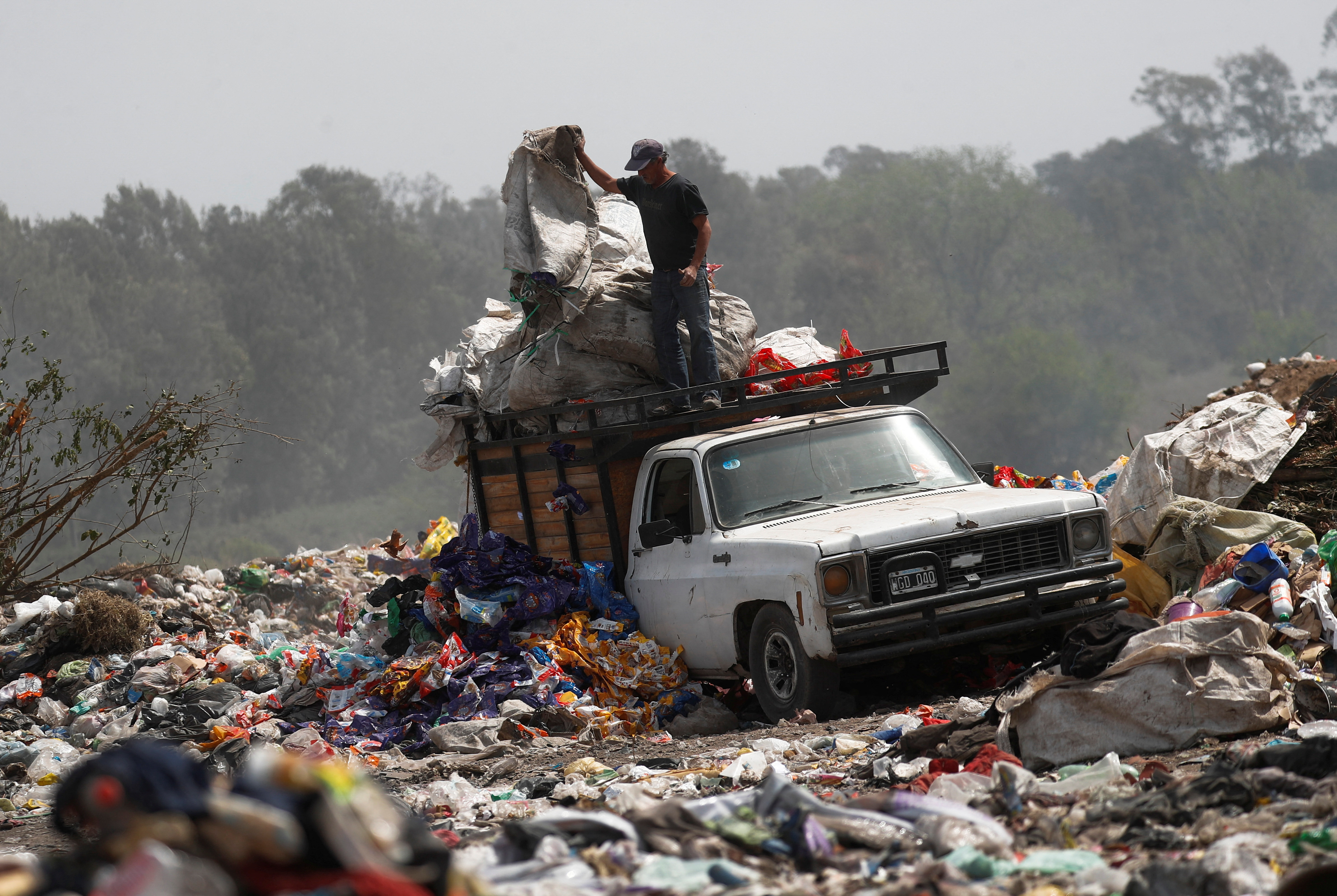 Barter clubs and rubbish dumps: poor Argentines feel the pain of 100% inflation