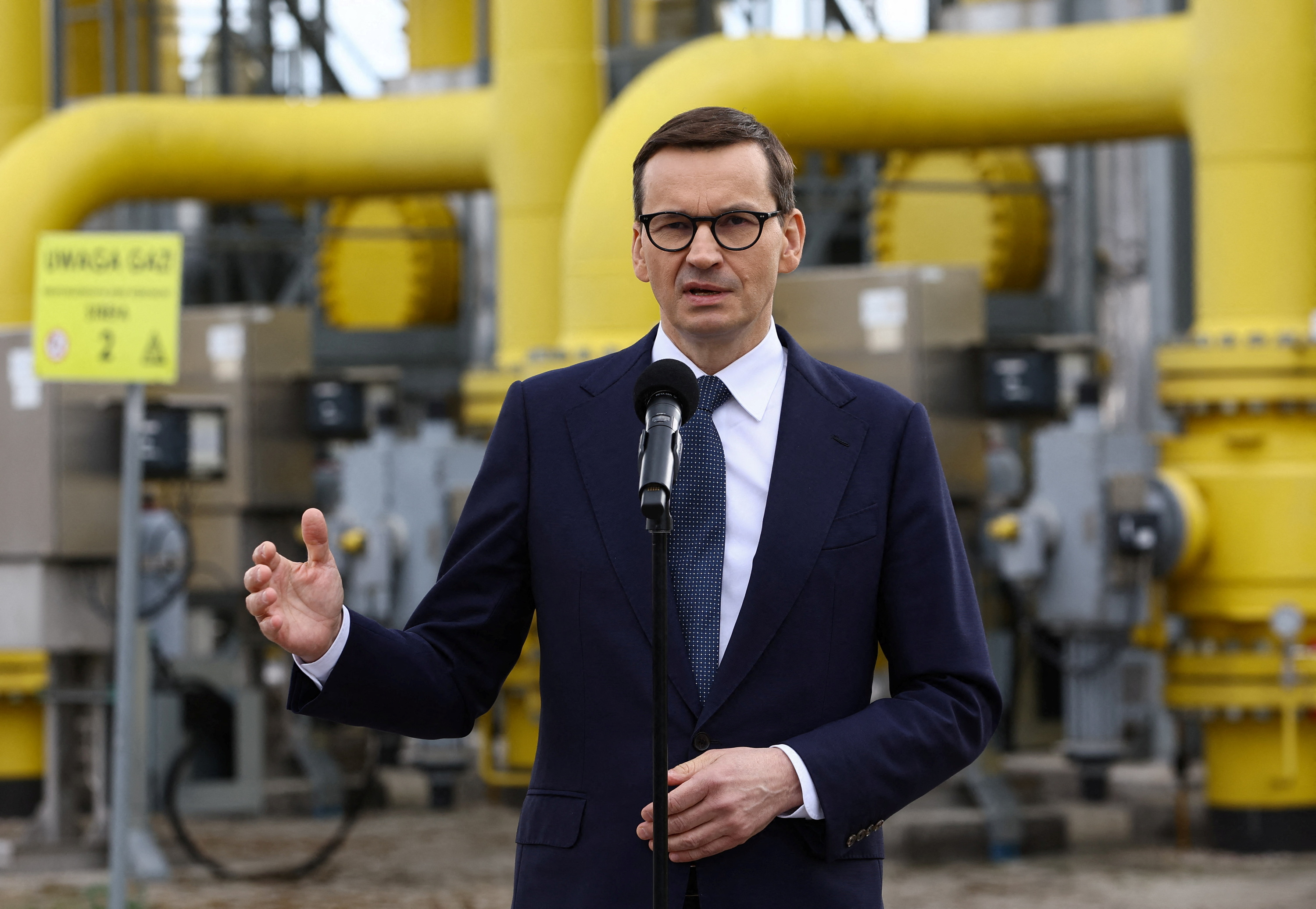 Poland's Prime Minister Mateusz Morawiecki speaks during a news conference near the gas installation at a Gaz-System gas compressor station in Rembelszczyzna