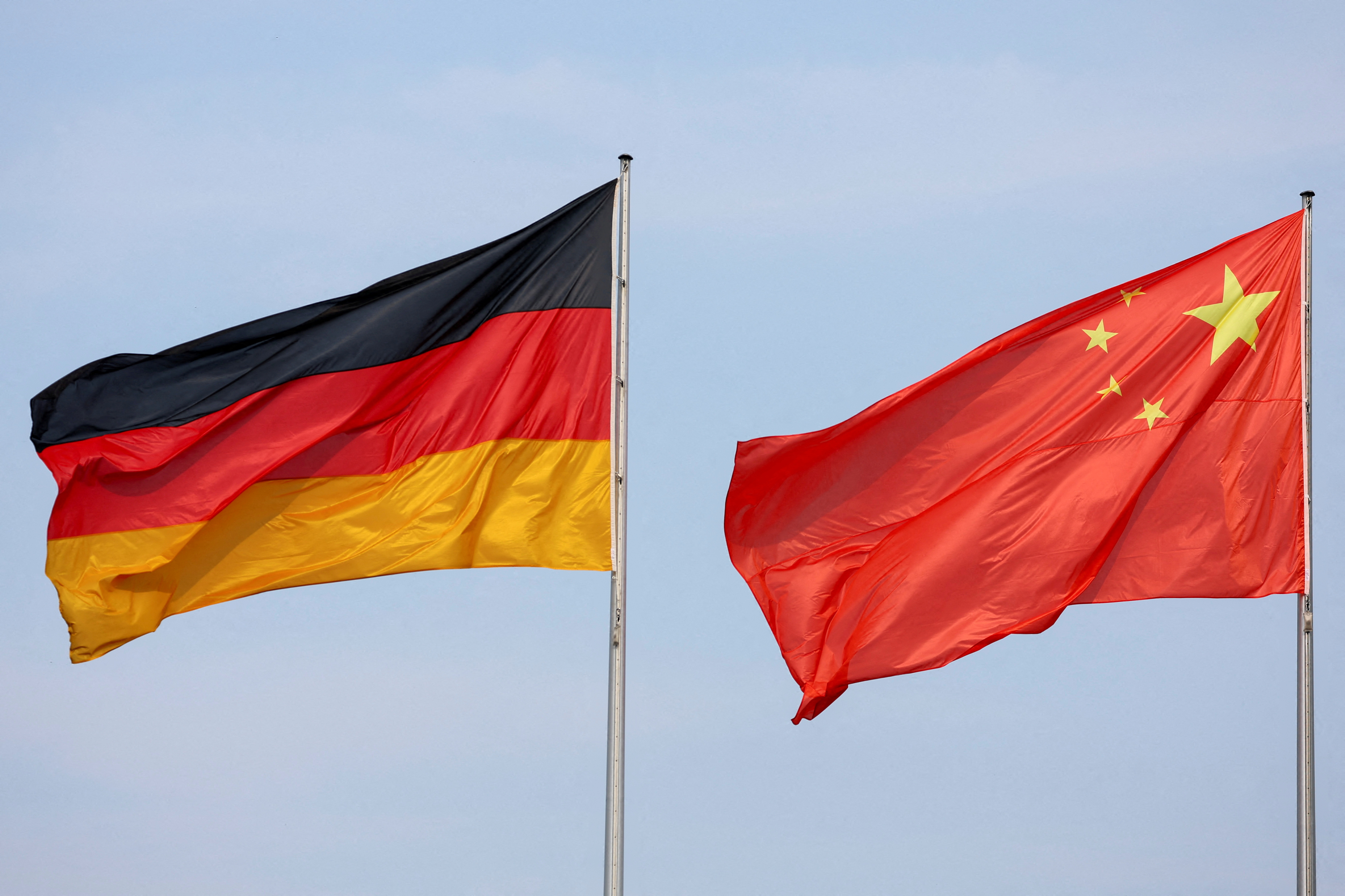 co\FILE PHOTO: The flags of Germany and China are seen in Berlin, Germany