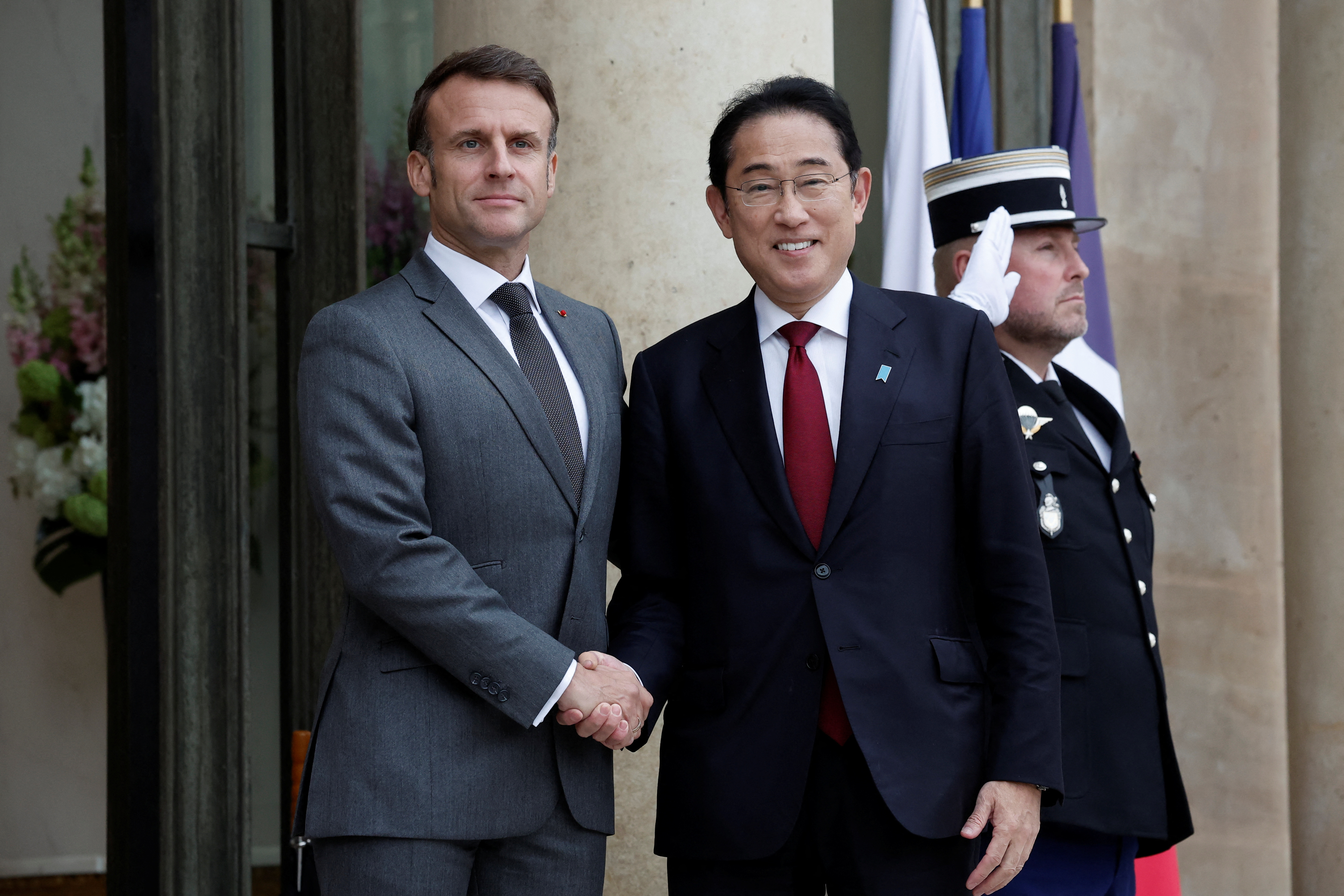 French President Macron meets Japan's Prime Minister Fumio Kishida at the Elysee Palace