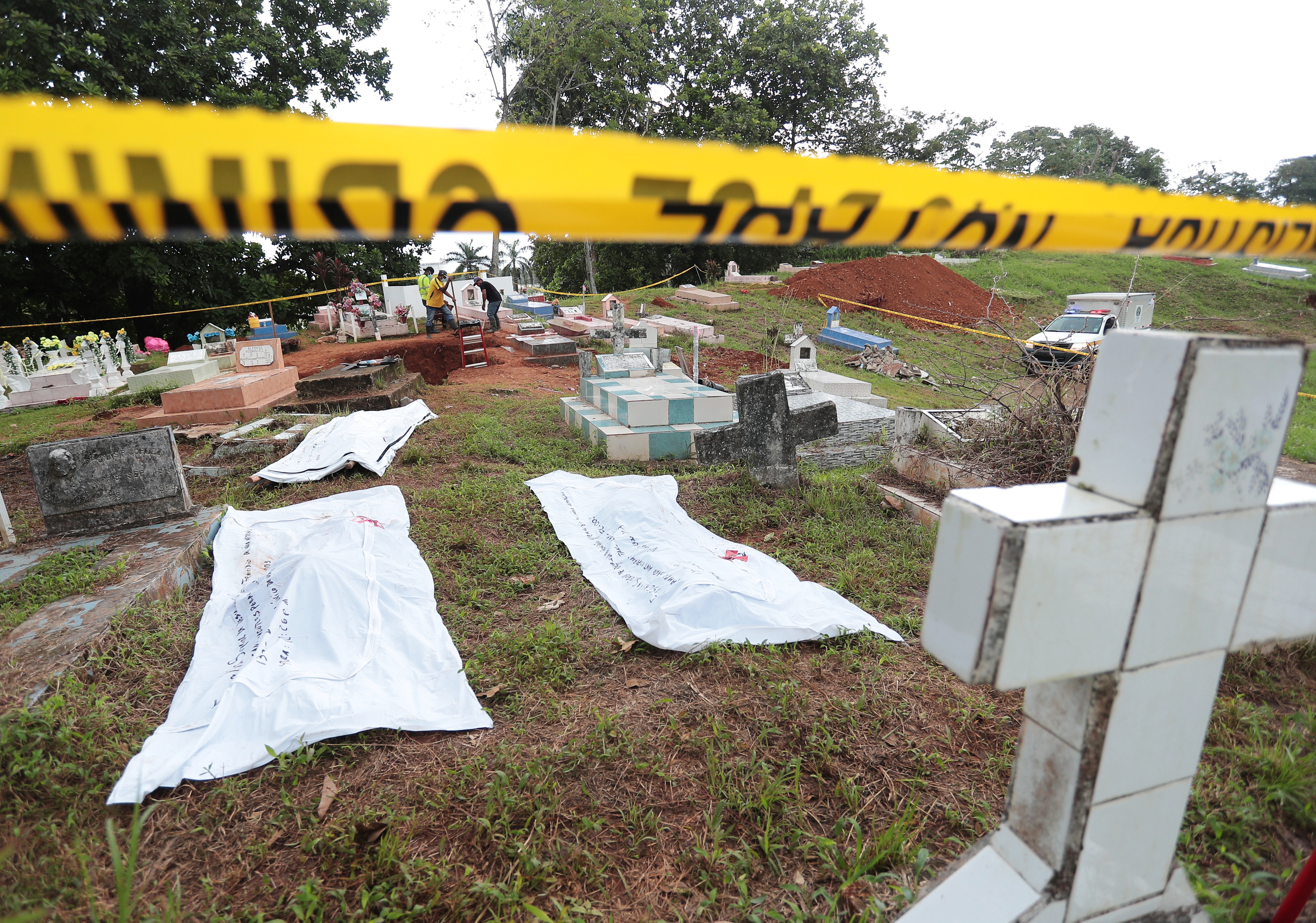 Panama searches mass graves for victims of 1989 U.S. invasion | Reuters