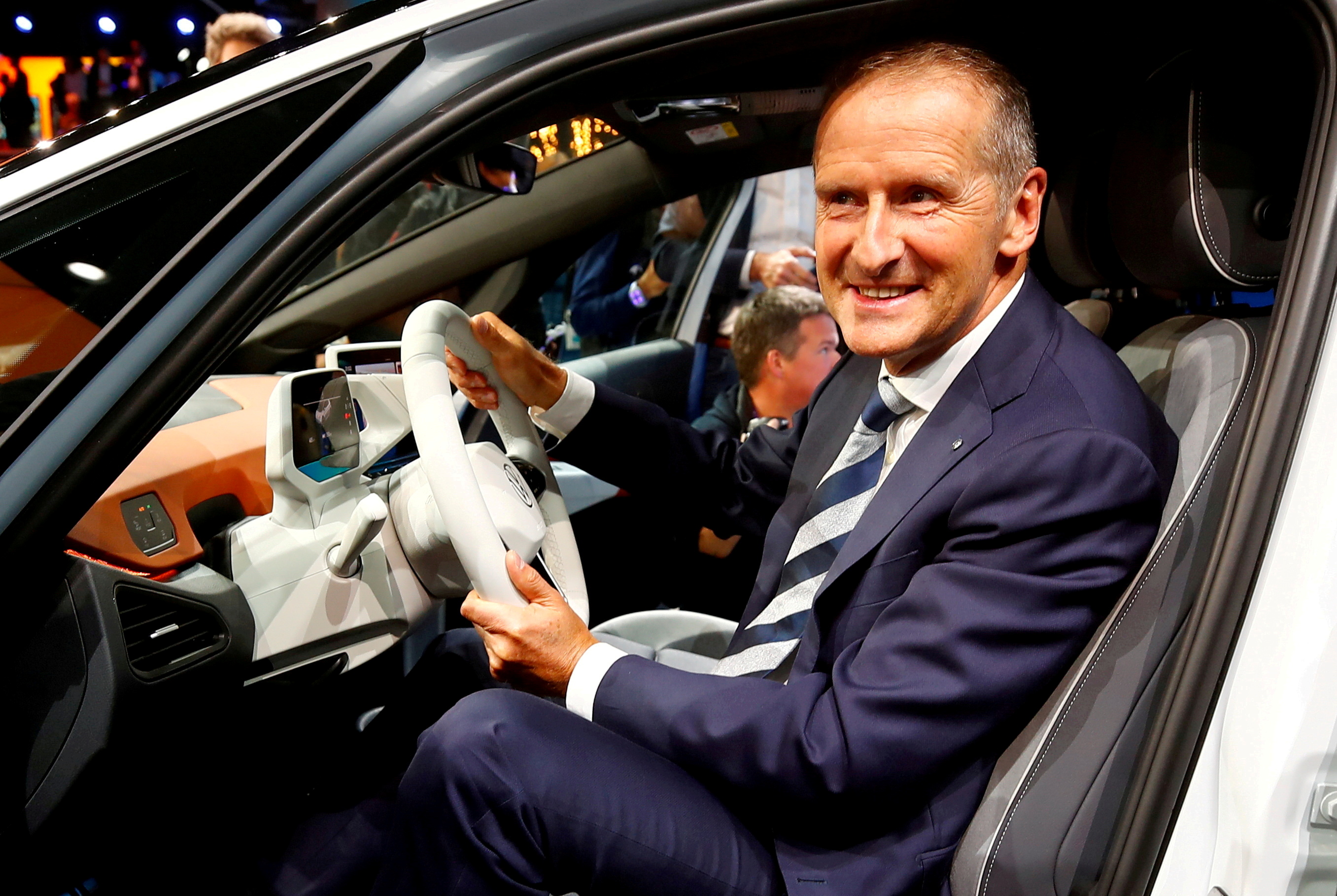 Herbert Diess, CEO of German carmaker Volkswagen AG, poses in an ID.3 pre-production prototype