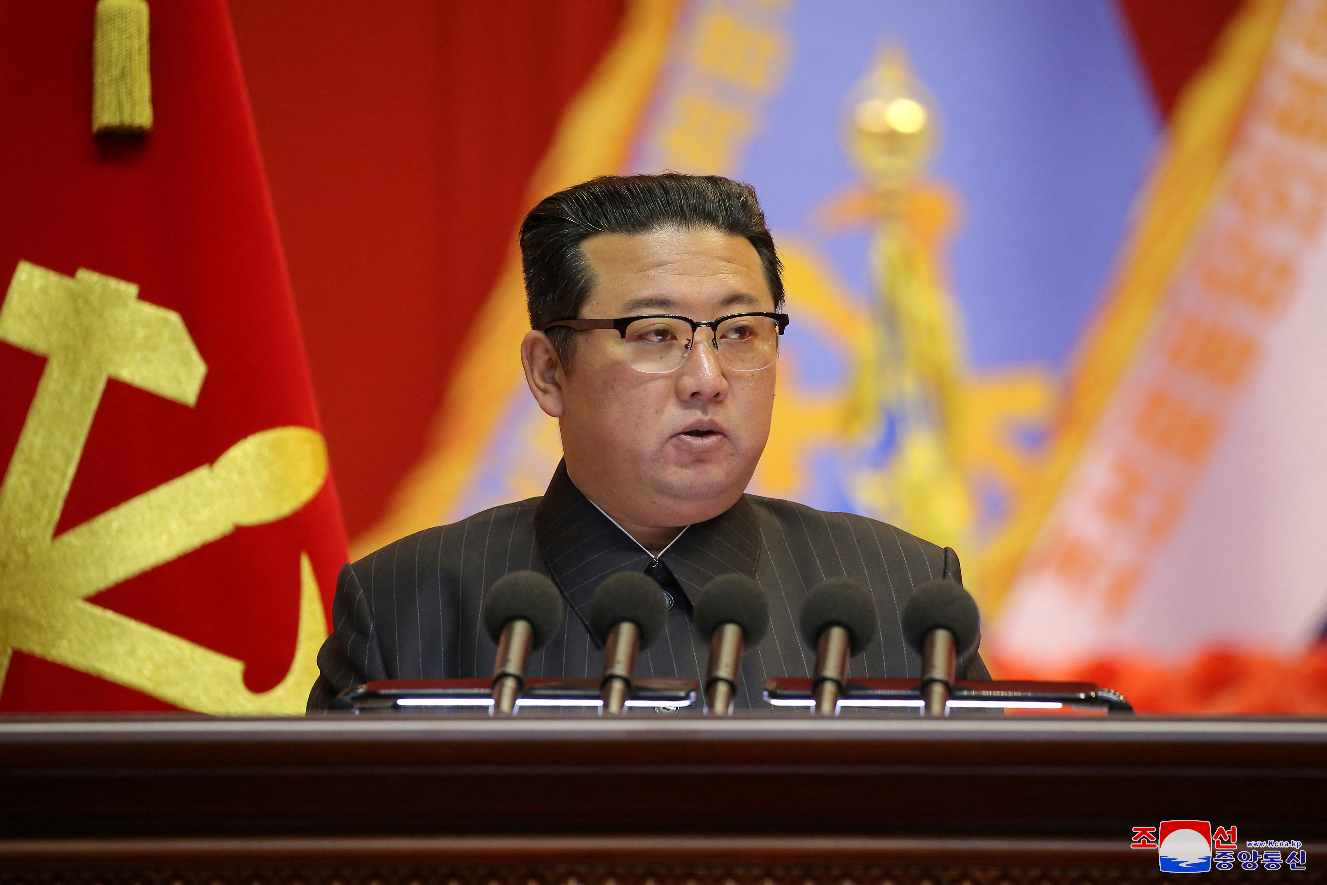 North Korean leader Kim Jong Un speaks during the Eighth Conference of Military Educationists of the Korean People's Army at the April 25 House of Culture in Pyongyang, North Korea in this undated photo released on December 7, 2021. KCNA via REUTERS 