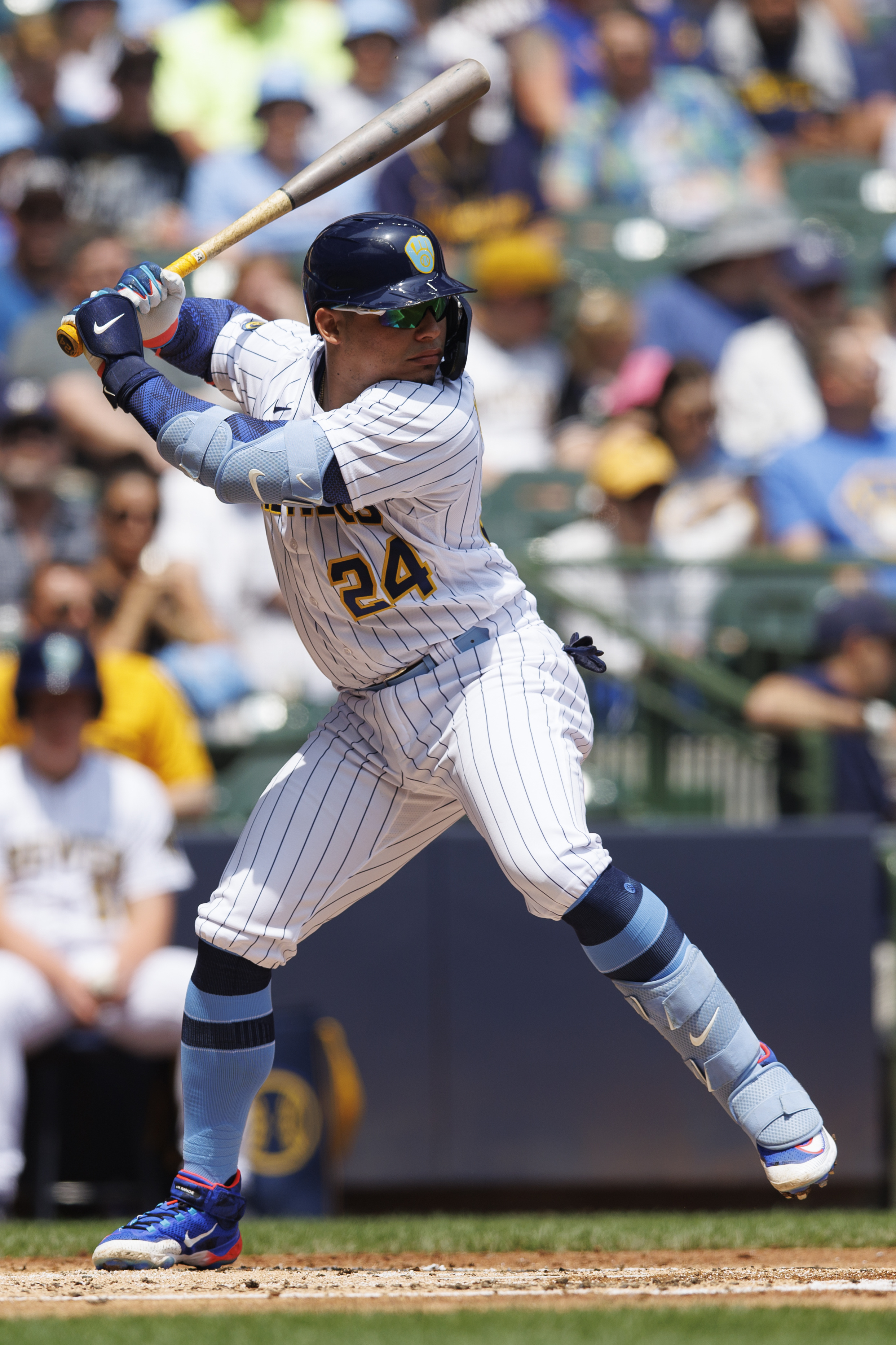 April 8, 2023: Milwaukee Brewers catcher William Contreras (24) hits a ball  during the game between the Milwaukee Brewers and the St. Louis Cardinals  at American Family Field on April 8, 2023