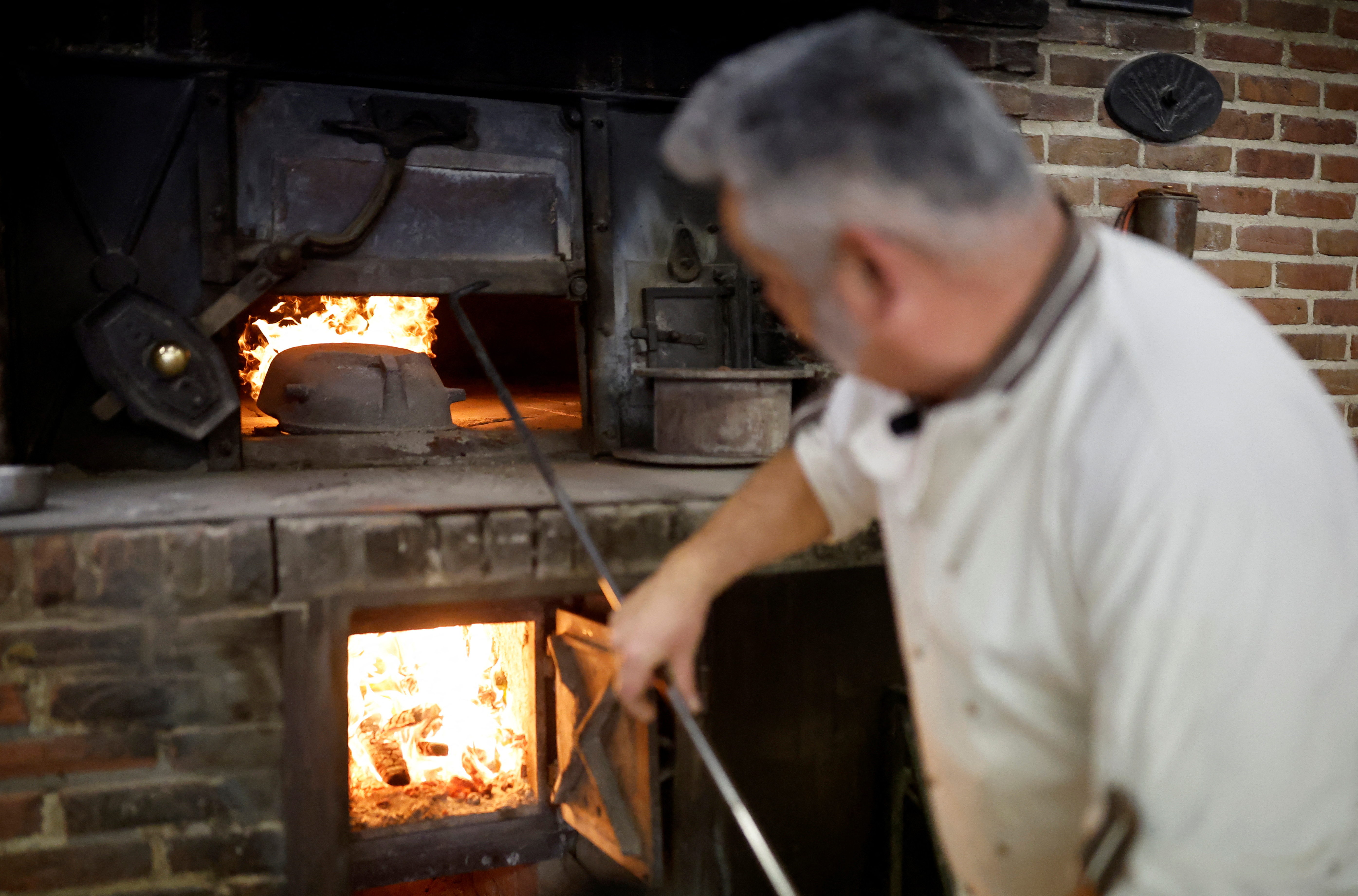 Back to basics: wood-fired oven shields French baker from soaring energy  costs