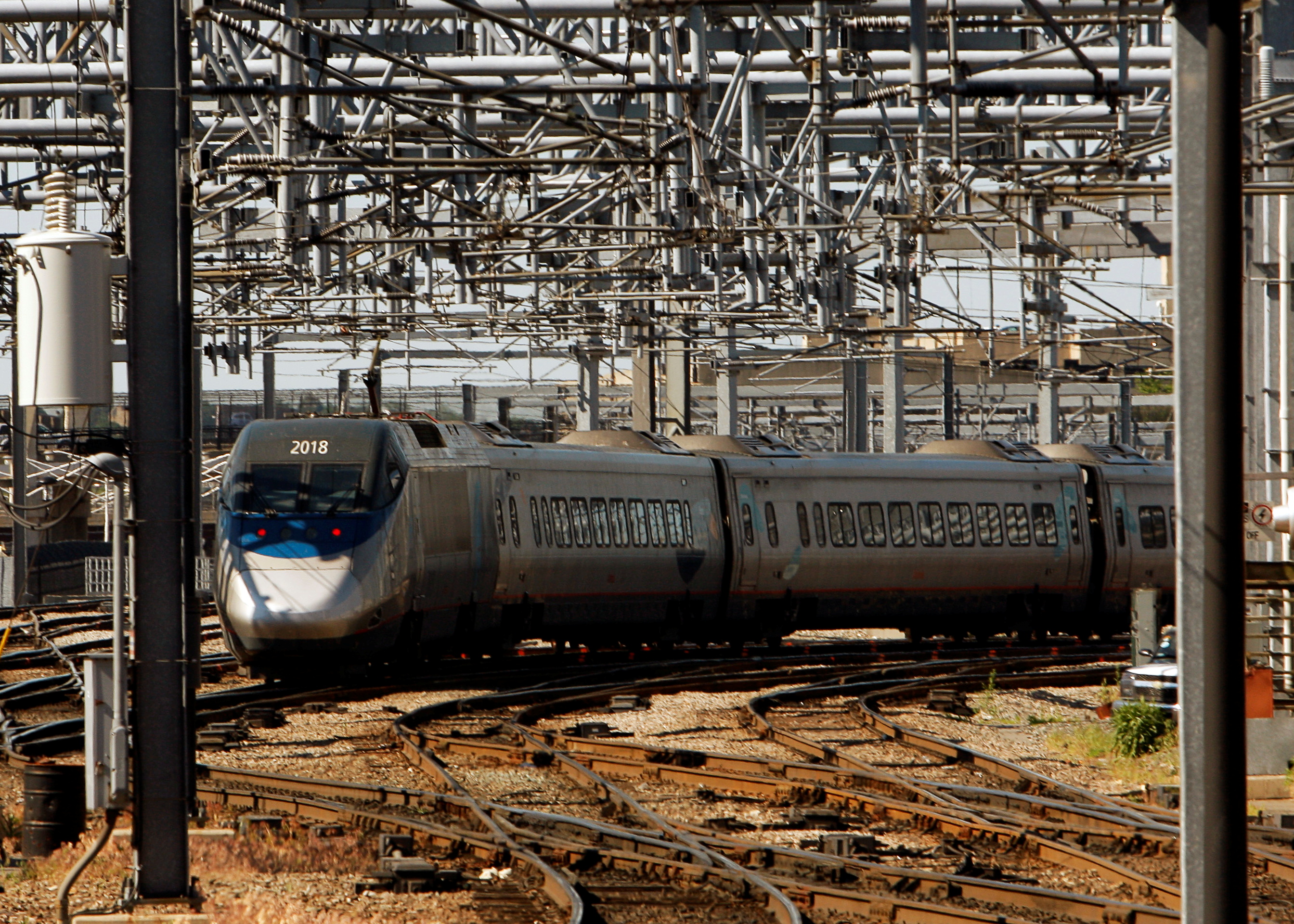 An Amtrak Acela Express train departs South Station in Boston