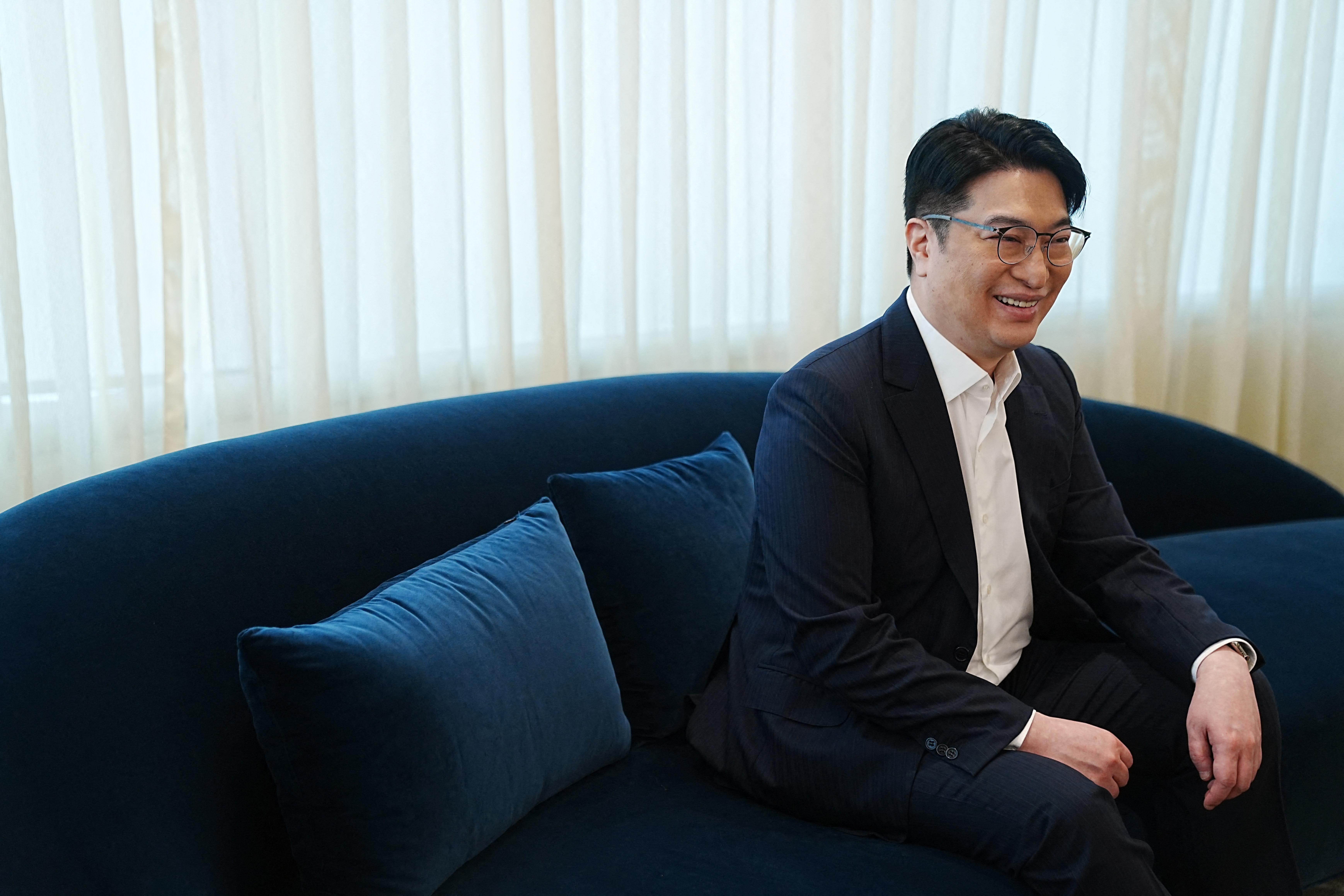 Martin Lee, co-chairman of Henderson Land Development, speaks at his office in Hong Kong