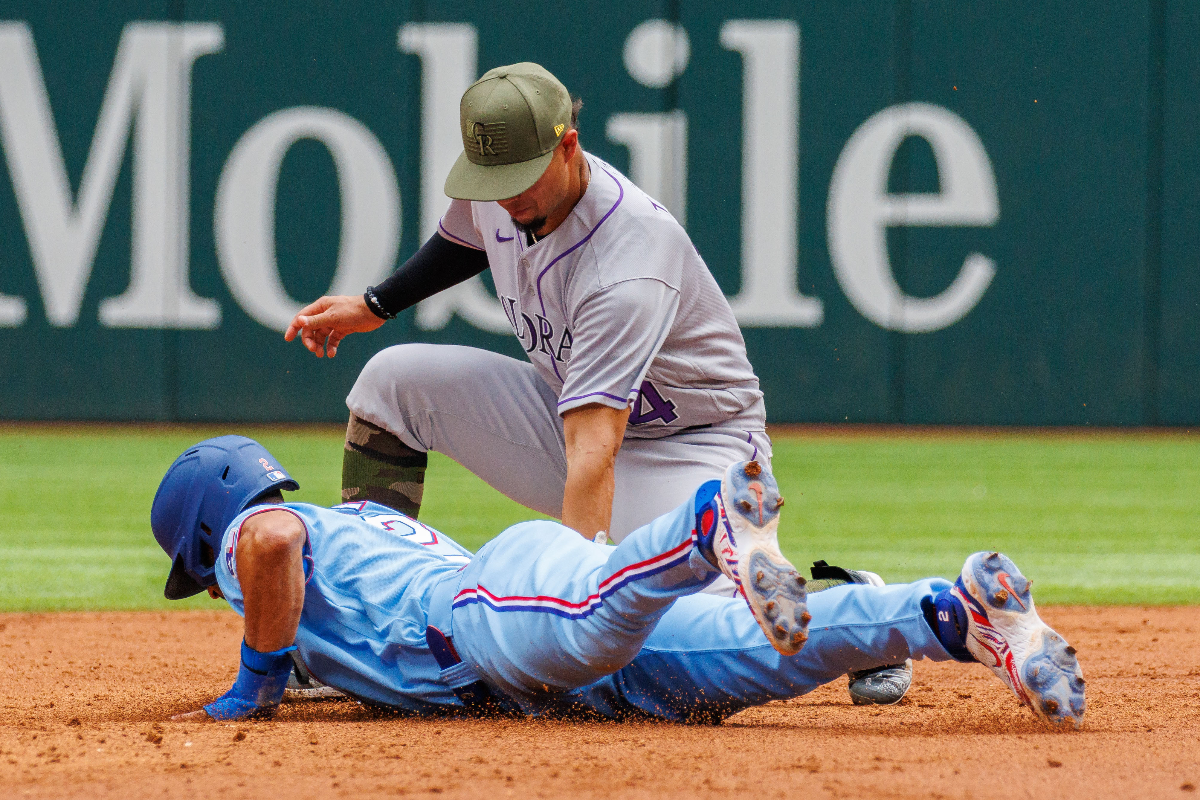 Rangers flex muscles in 13-3 rout to sweep Rockies
