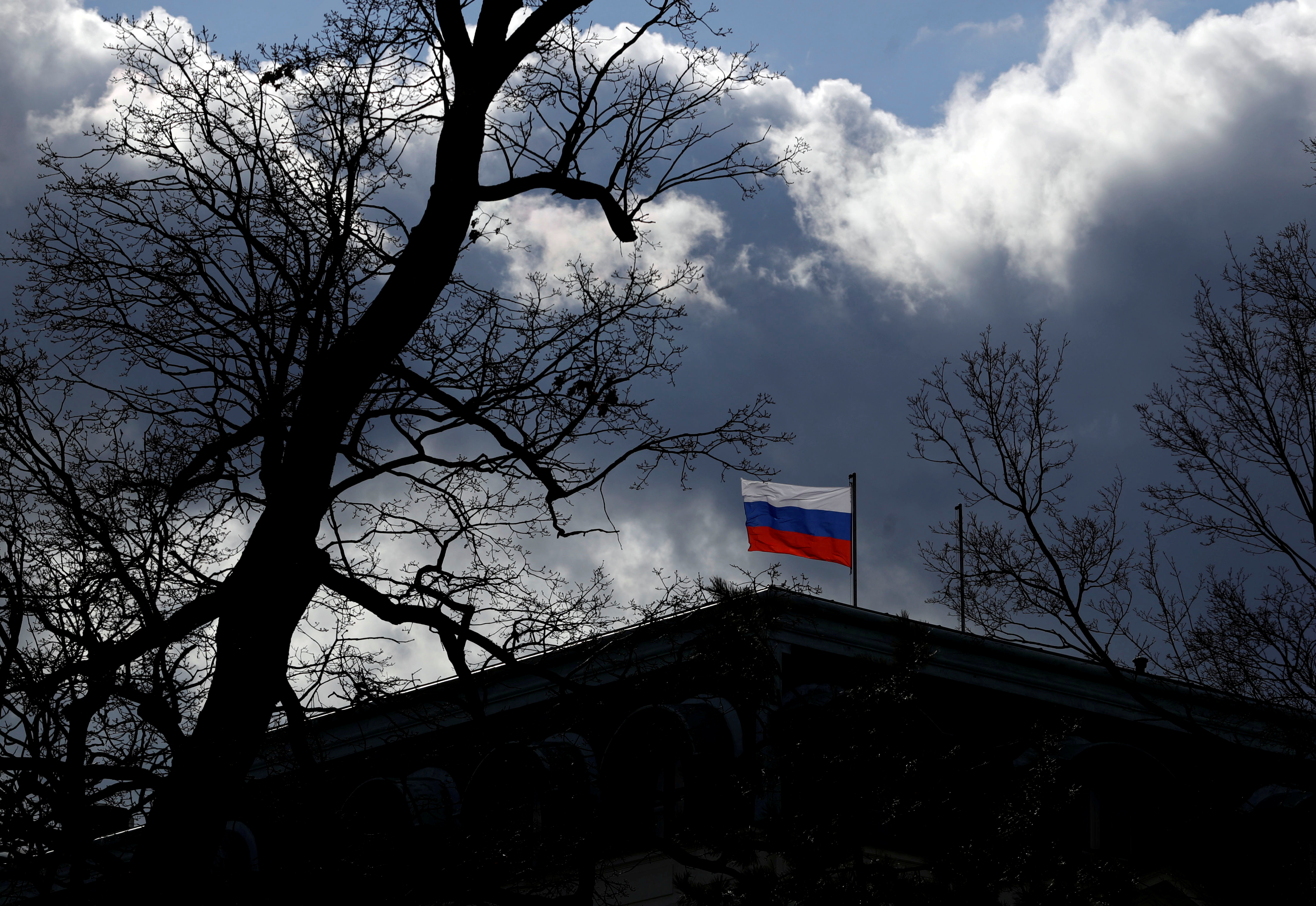 The national flag flutters on top of the Russian embassy in Prague