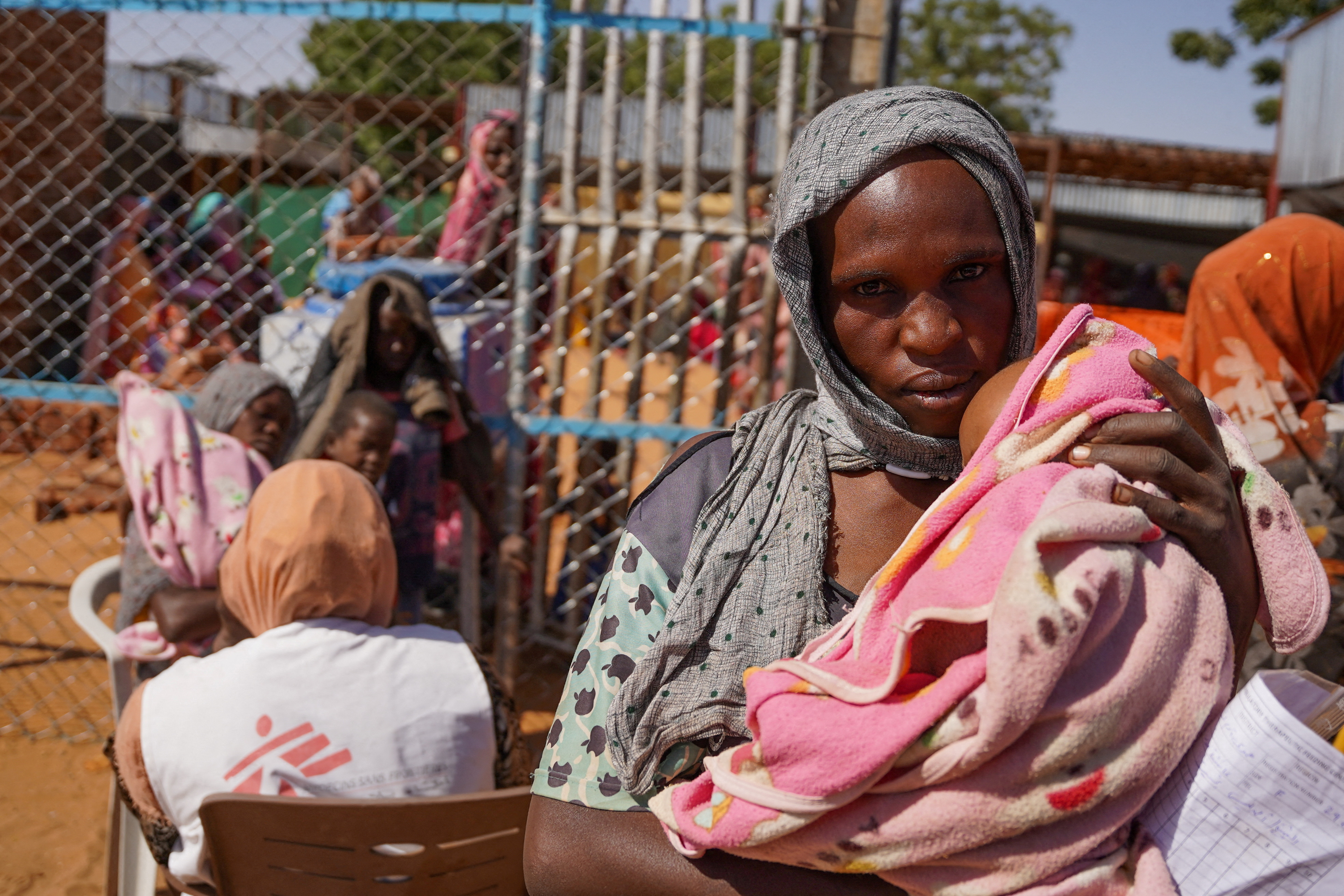 Handout photograph of a woman and baby at the Zamzam displacement camp in North Darfur