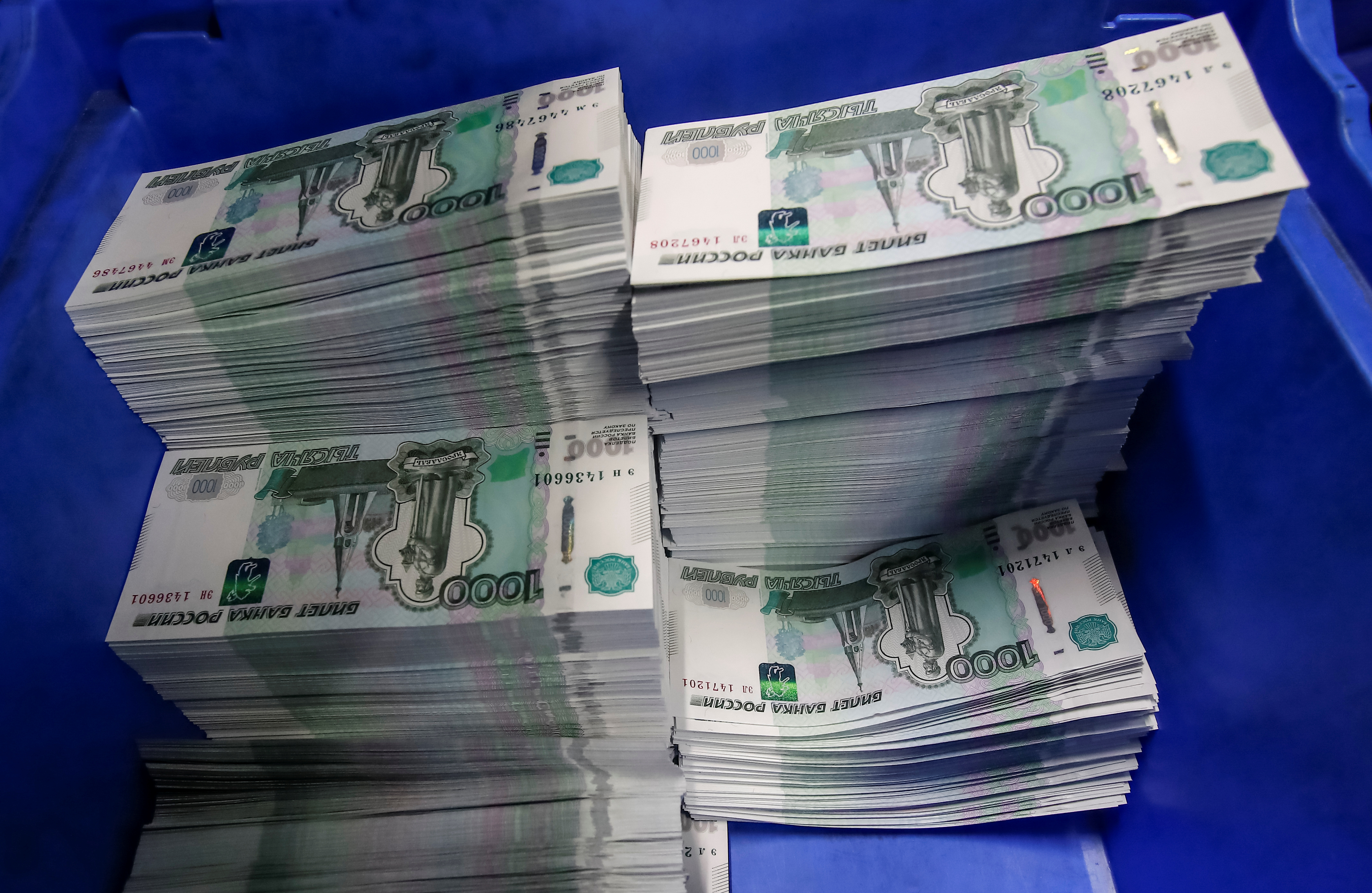 Stacks of 1000 Russian Roubles notes are pictured at Goznak printing factory in Moscow