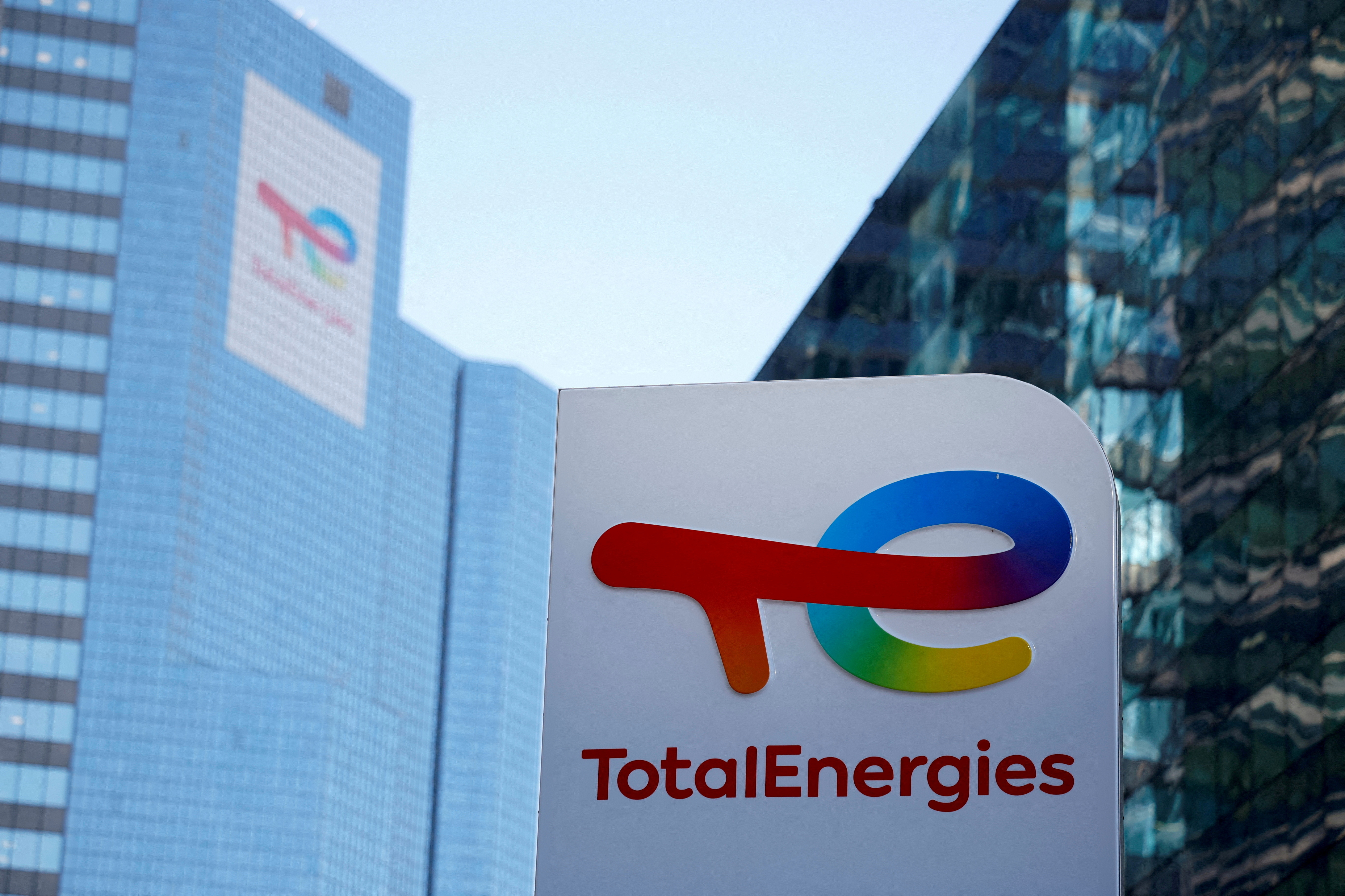 FILE PHOTO: Logo of TotalEnergies at an electric vehicle fuelling station near Paris