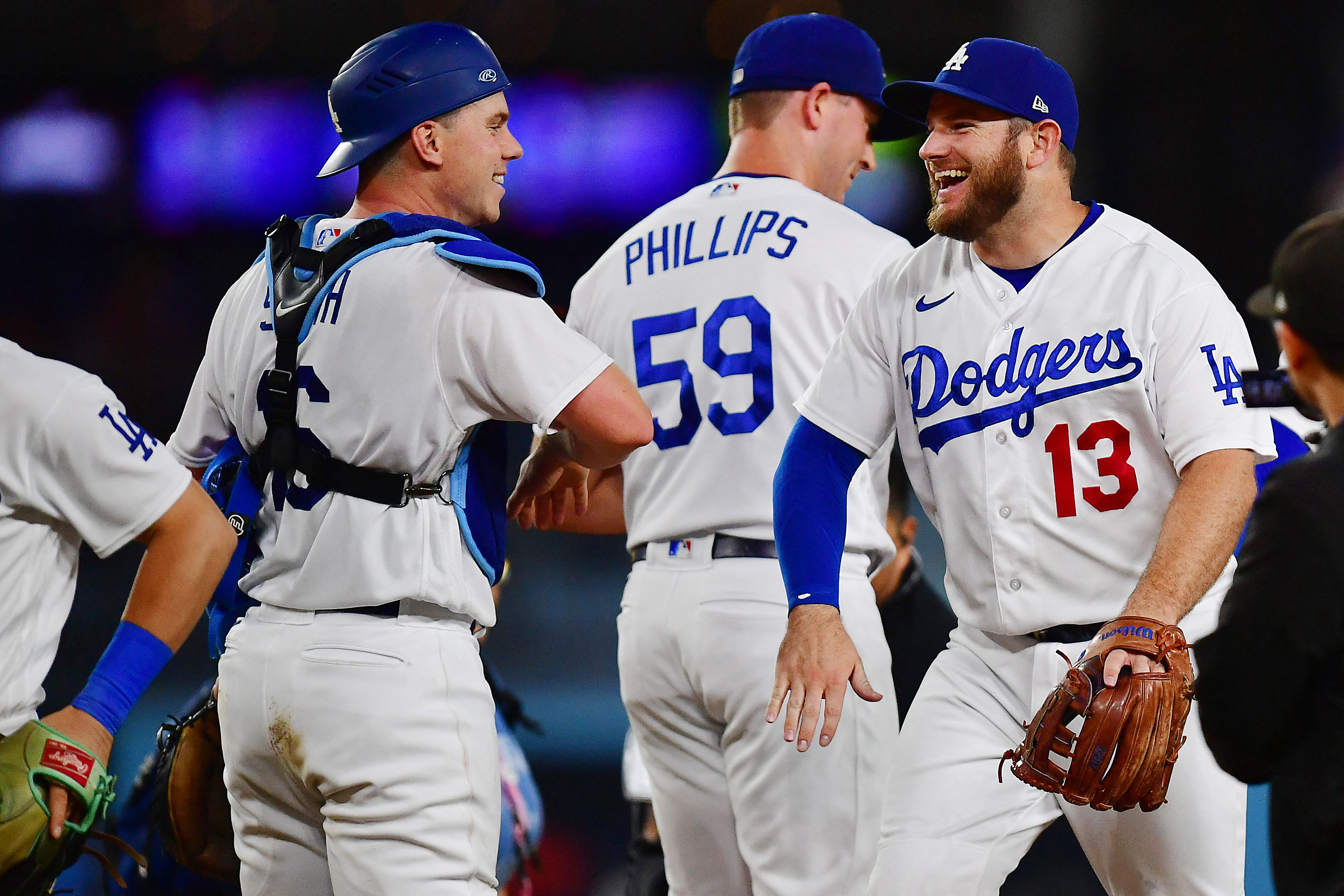 Los Angeles Dodgers' Max Muncy smiles after hitting a two-run home run  against the Cincinnati Reds during the first inning of a baseball game in  Los Angeles, Saturday, July 29, 2023. (AP