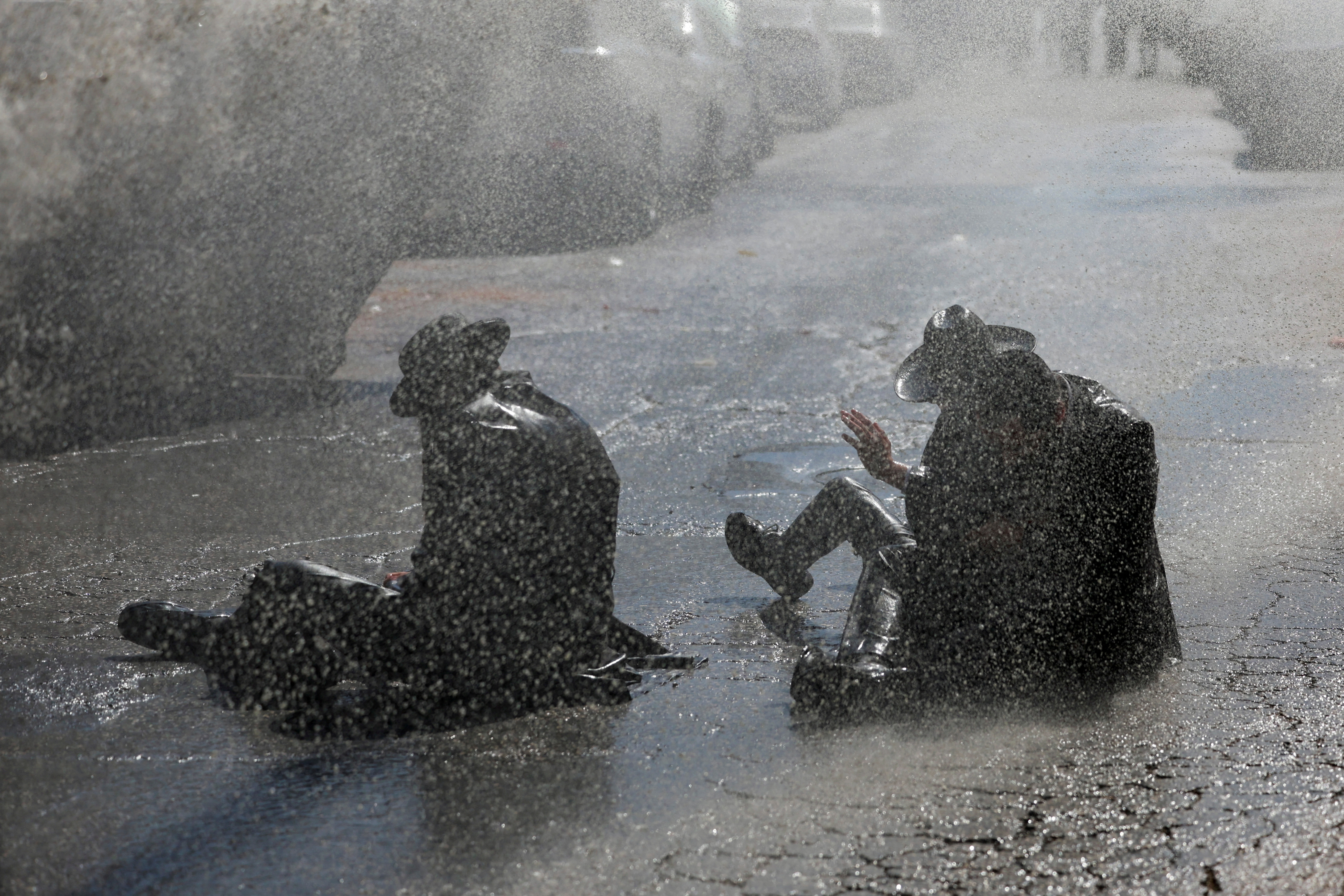 Ultra-Orthodox Jewish men protest against attempts to recruit men from the community, in Jerusalem