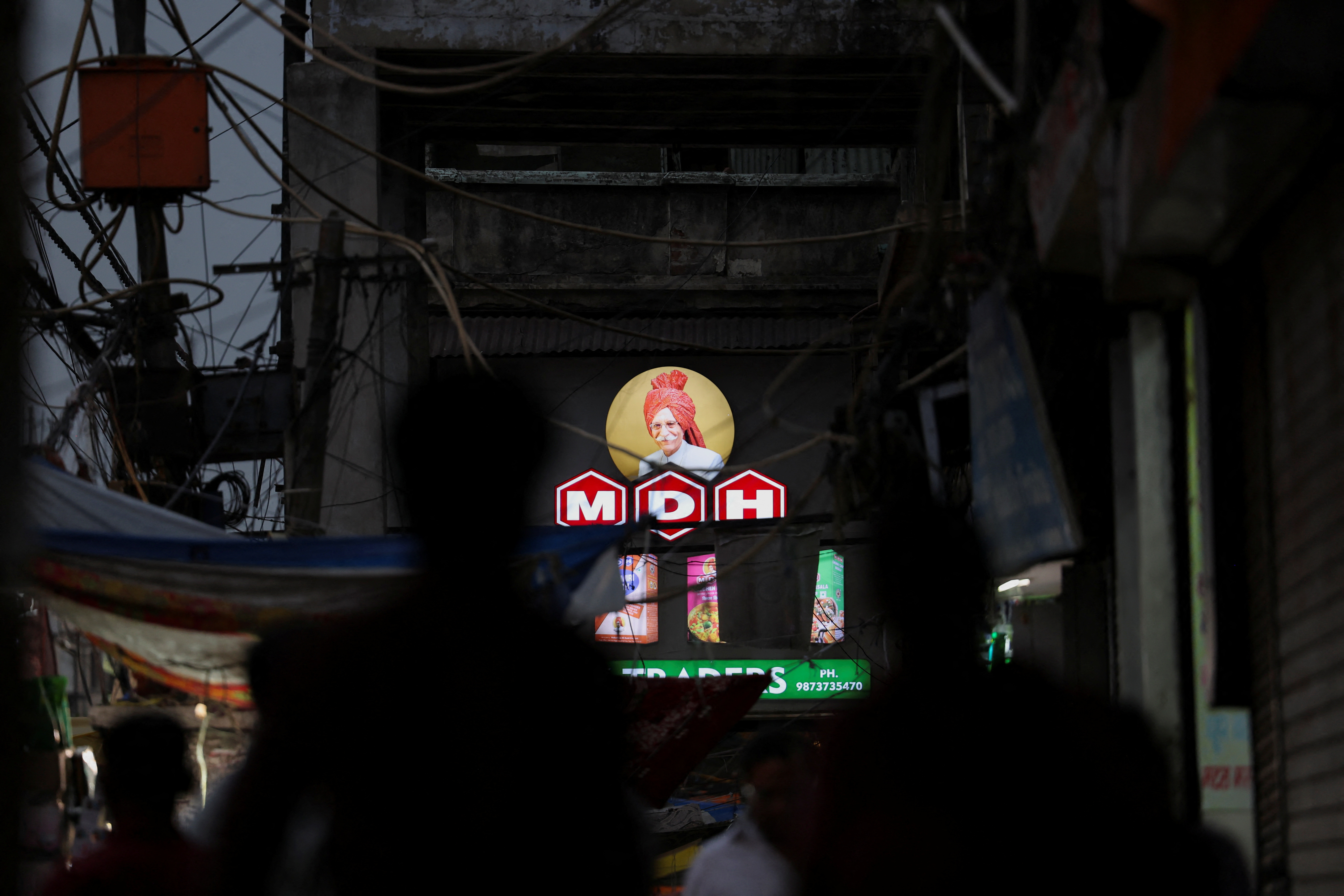 A view of the logo of MDH, an Indian spice manufacturing company, on a shop in the old quarters of Delhi