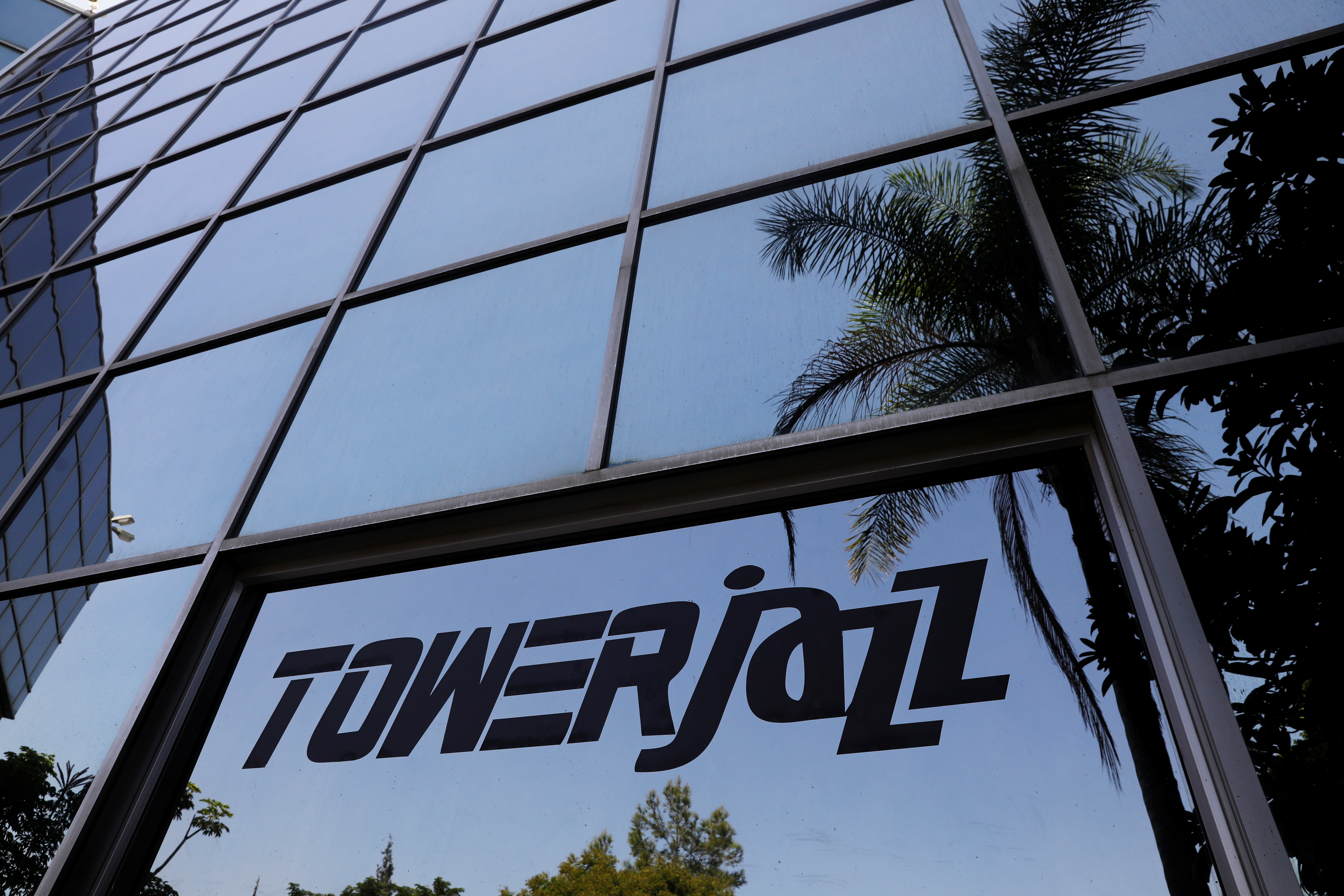 The logo of Israeli chipmaker TowerJazz is seen at their offices in Migdal HaEmek, northern Israel September 13, 2017. REUTERS/Ronen Zvulun