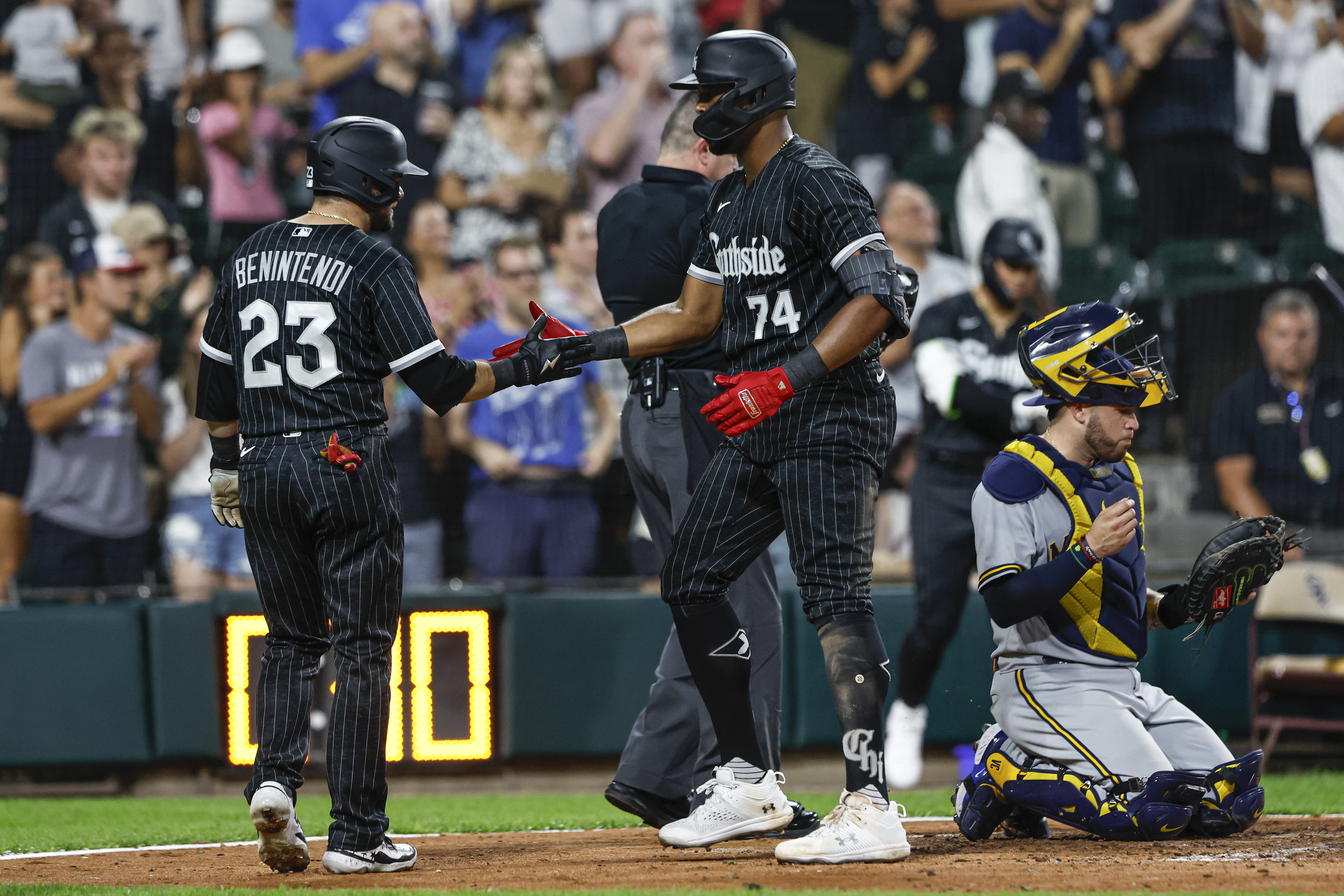 Brewers need extras again, top White Sox in 10 innings