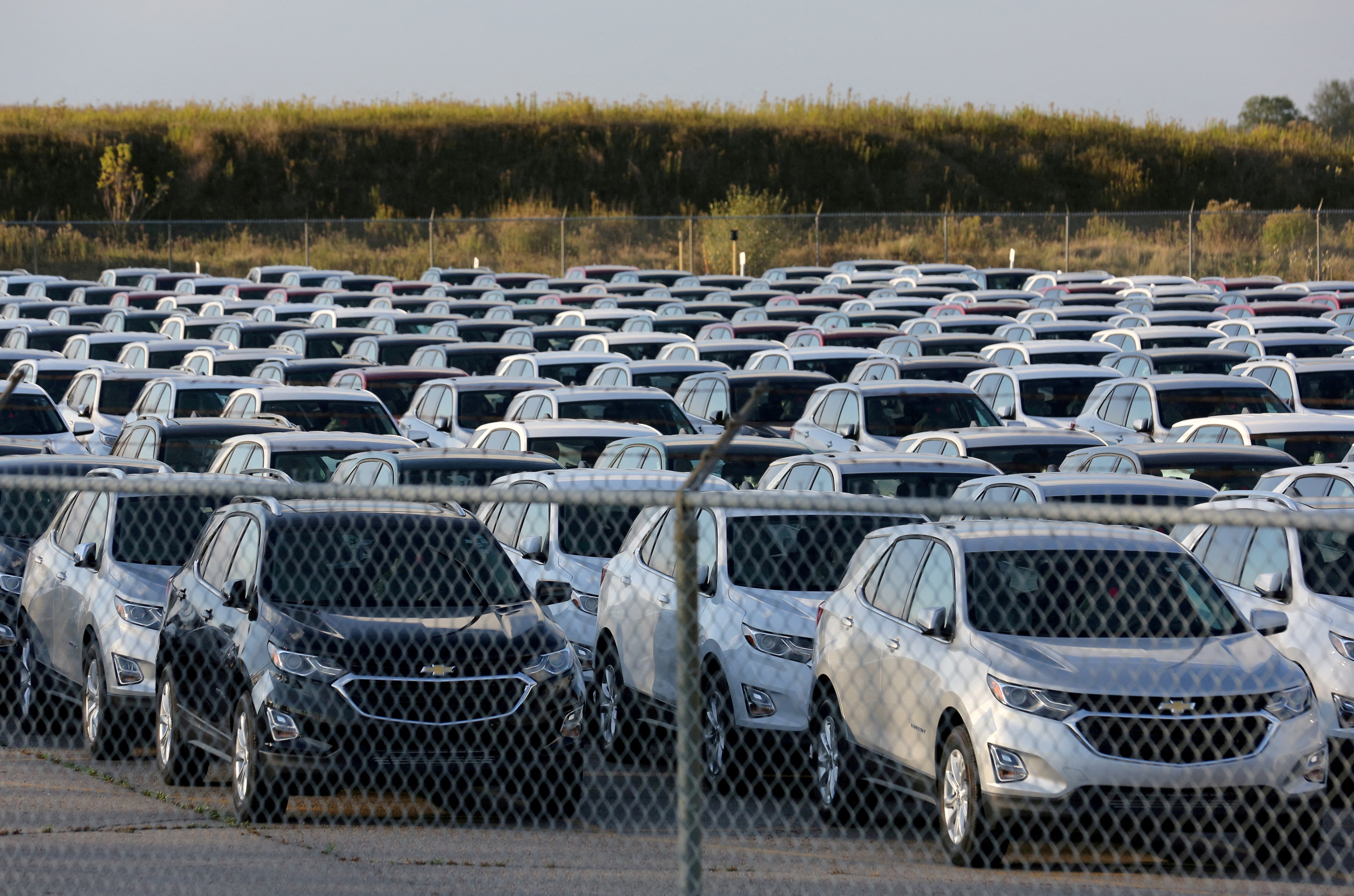 FILE PHOTO: Chevrolet Equinox SUVs are parked awaiting shipment near the General Motors Co (GM) CAMI assembly plant in Ontario