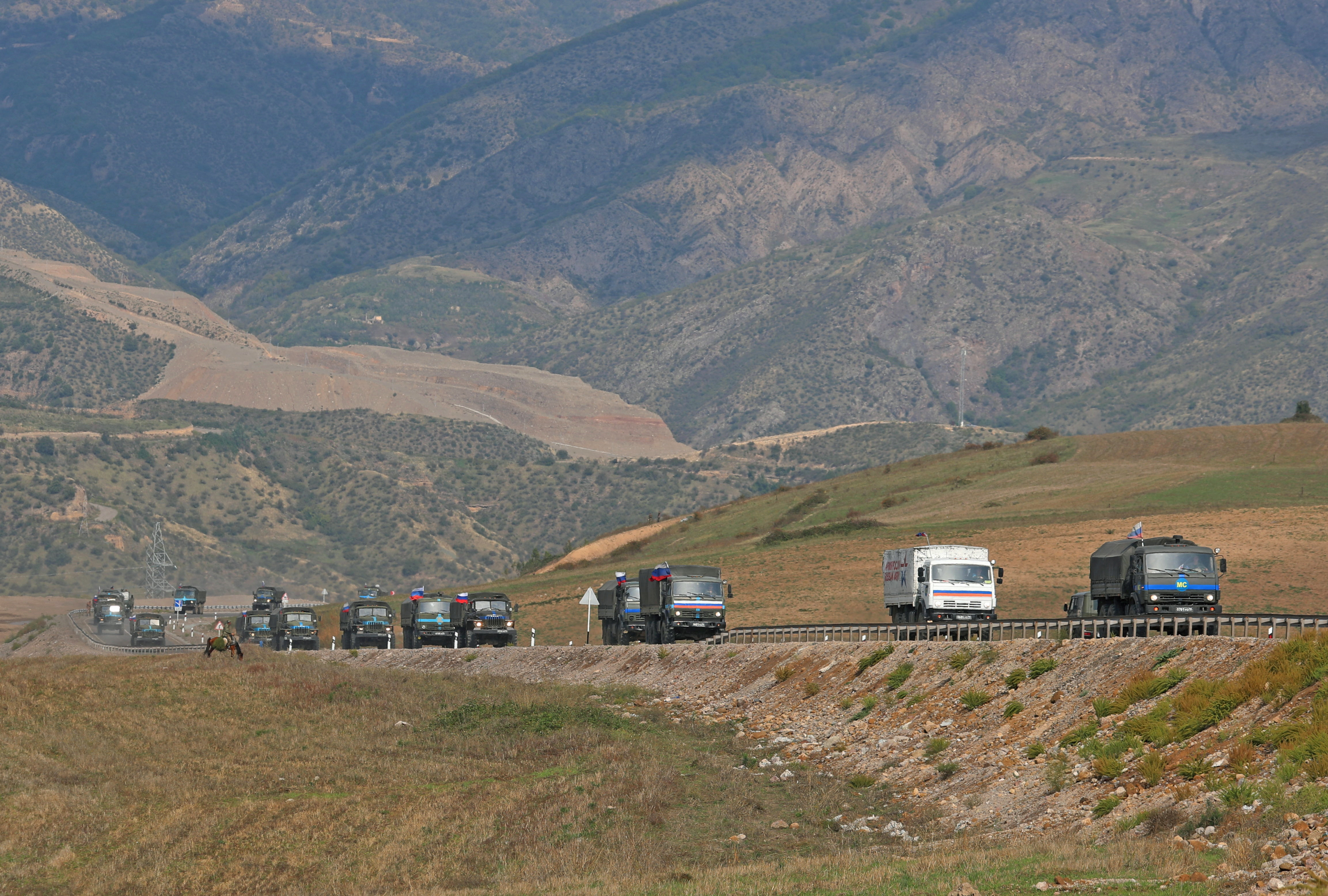 Russian peacekeepers to escort Nagorno-Karabakh homeless families to Armenia  | Reuters